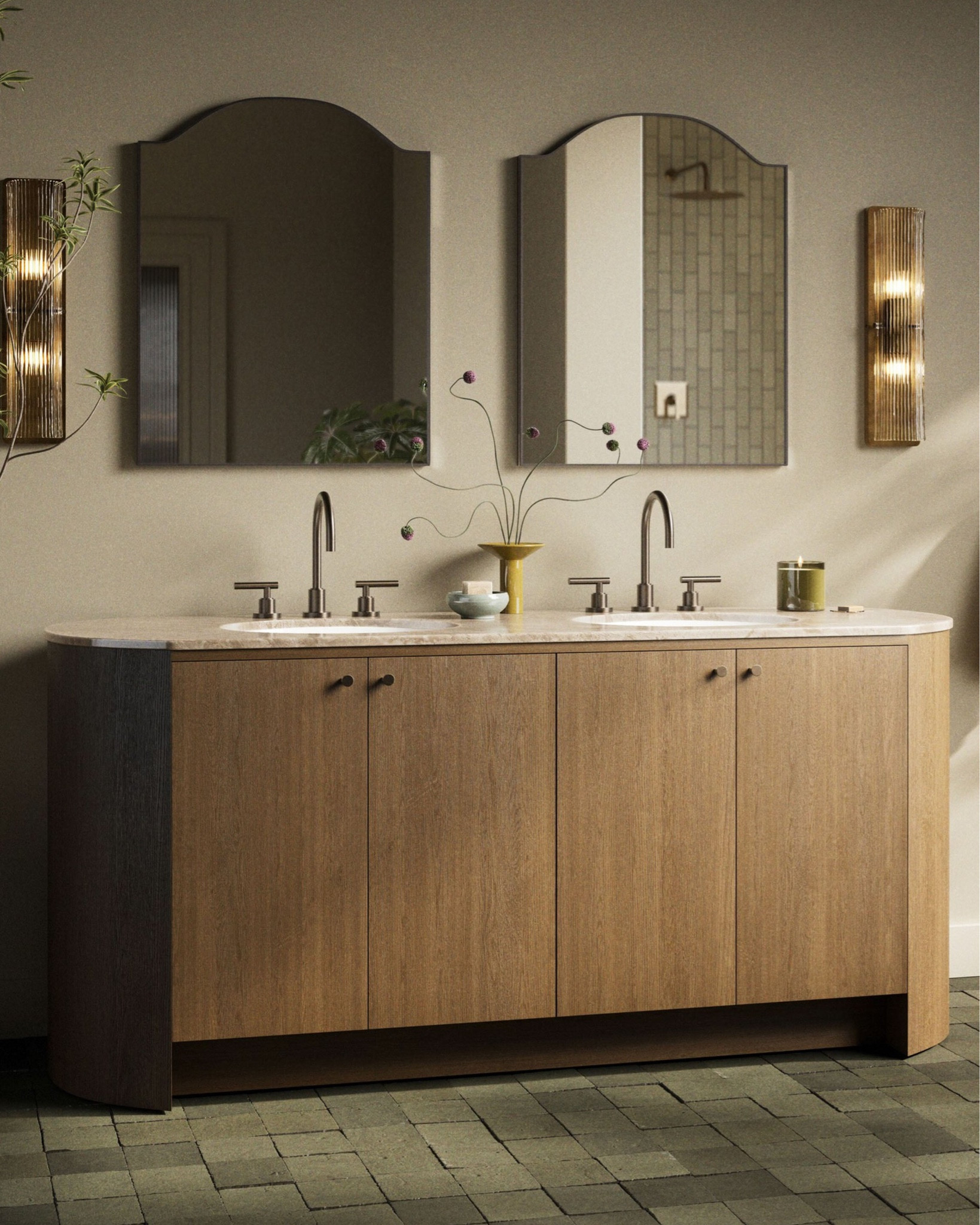 Soft curves define the Sadiya bath vanity, giving the pill-shaped silhouette a modern edge. A natural marble top crowns the monochromatic oak base, while rounded hardware and a recessed plinth add subtle detail. Inside, adjustable shelving offers generous storage for every essential.

#LTKSaleAlert #LTKHome
