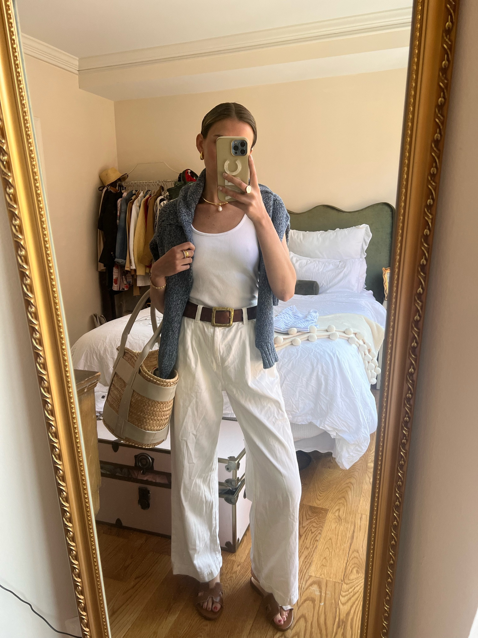 White pants / white tank / polo sweater / raffia bag / western belt 

#LTKWorkwear #LTKFindsUnder100 #LTKStyleTip