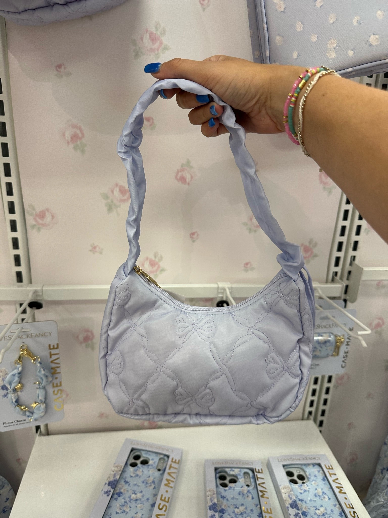 The cutest blue ribbon loveshackfancy shoulder bag from the Target collab! Low in stock & priced at $24!

#LTKKids #LTKSaleAlert #LTKootd
