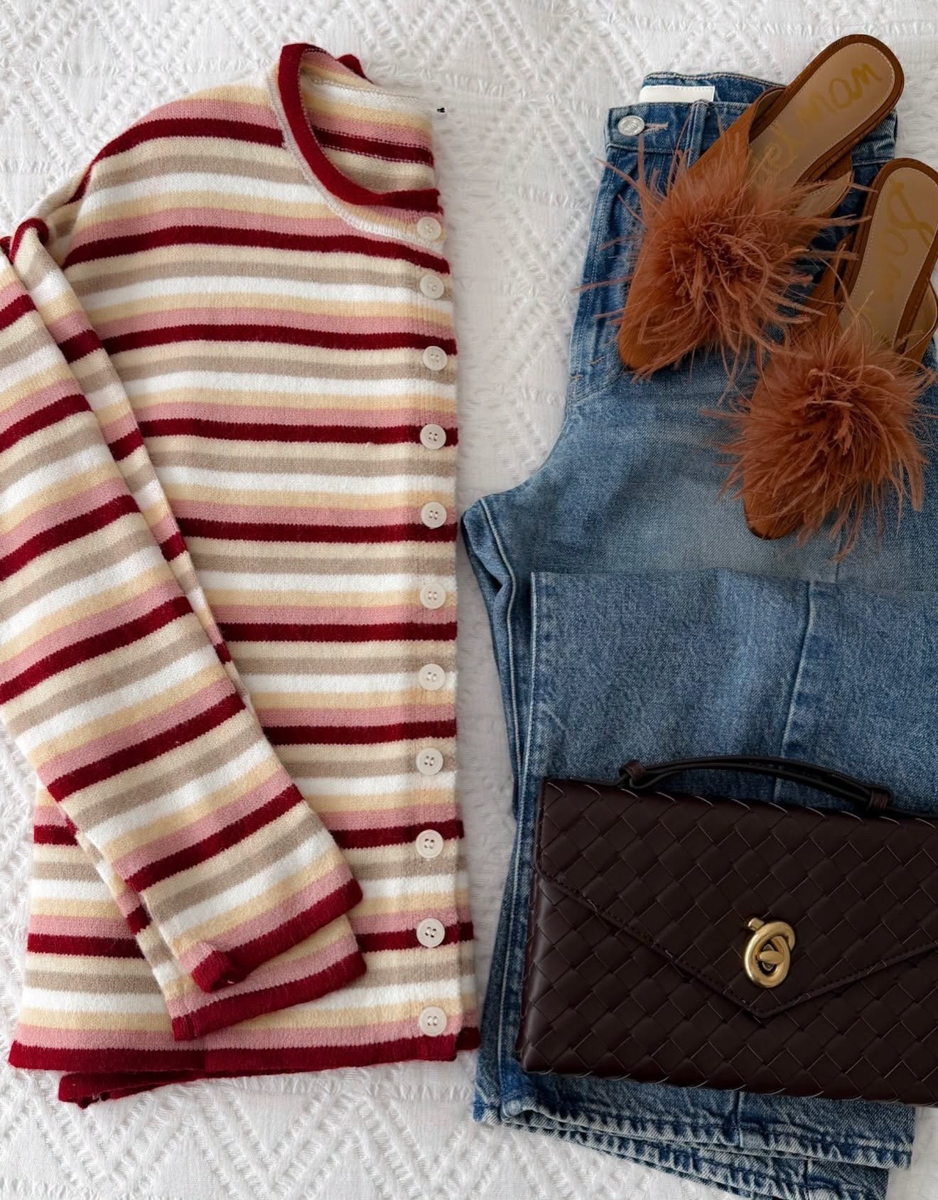 This striped cardigan is such a fun way to bring more color into a fall outfit. I love the mix of red, blush and cream with classic denim, then the feathered mules and chocolate woven bag make the whole look feel a little more special.

striped cardigan, fall cardigan, denim outfit, feather mules, fall shoes, chocolate brown bag, colorful fall outfit, casual fall style, women’s fashion, fall accessories, annabrstyle

#LTKootd #LTKSeasonal #LTKOver40