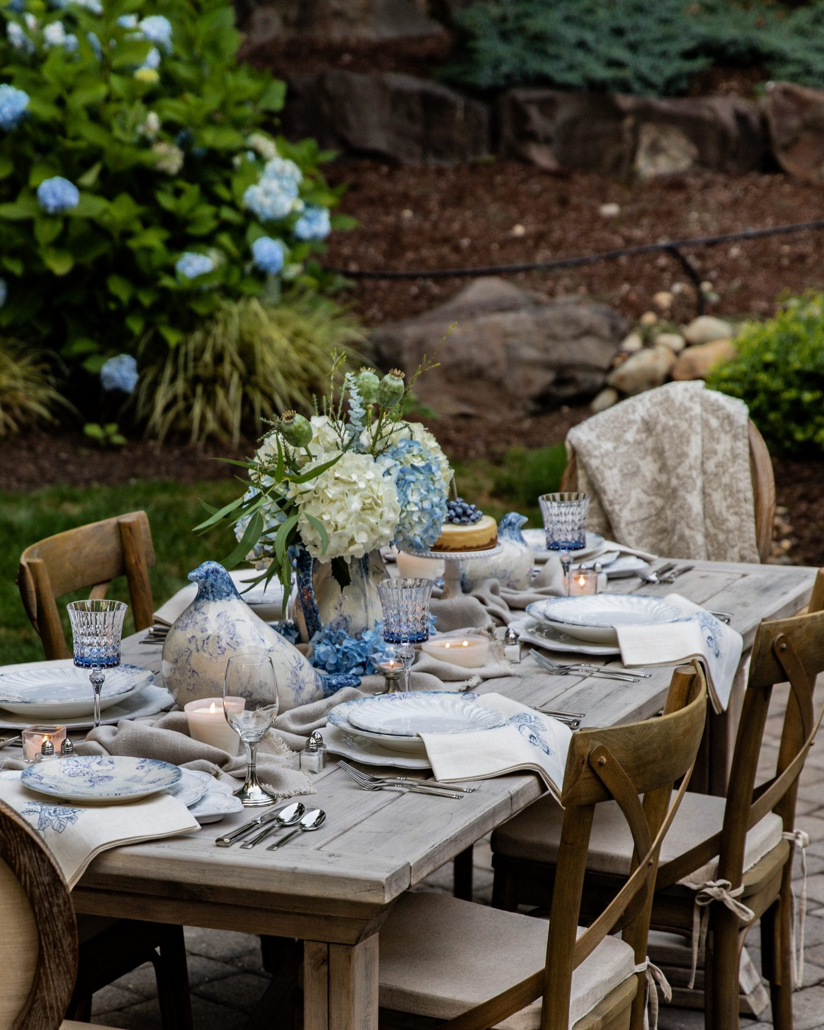 Outdoor dining, elevated 🤍🌿 This spring-to-summer tablescape features timeless pieces from Arte Italica and the prettiest layered details. Tap to shop the look in my LTK + recreate this elegant setup at home! #LTKhome #outdoordecor #tablescapeideas #summerhosting #homewithhollyj 

 #LTKfoodie #LTKSeasonal #LTKHome