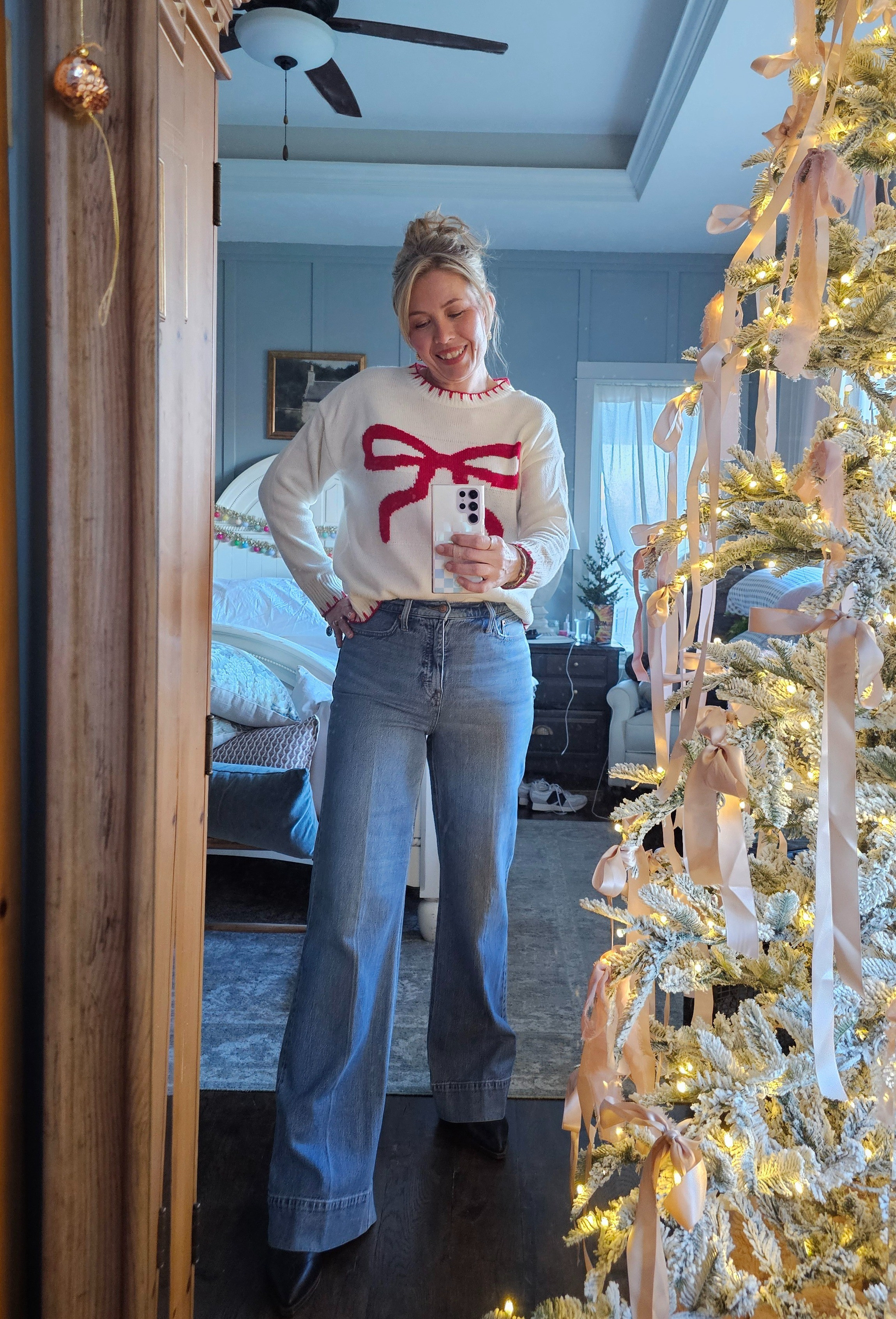 Festive sweater and jeans combo

#LTKHoliday #LTKOver40 #LTKTall