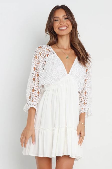 Loving this short white dress for a summer dress or vacation dress. It is so cute for family photos on the beach or as an engagement photo. 

White dress / short white dress / petal and pup / engagement photo dress / family photo dress 

#LTKstyletip #LTKSeasonal #LTKsalealert