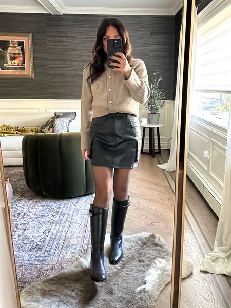 Boots, cargo skirt. 

#LTKSeasonal #LTKHoliday #LTKshoecrush