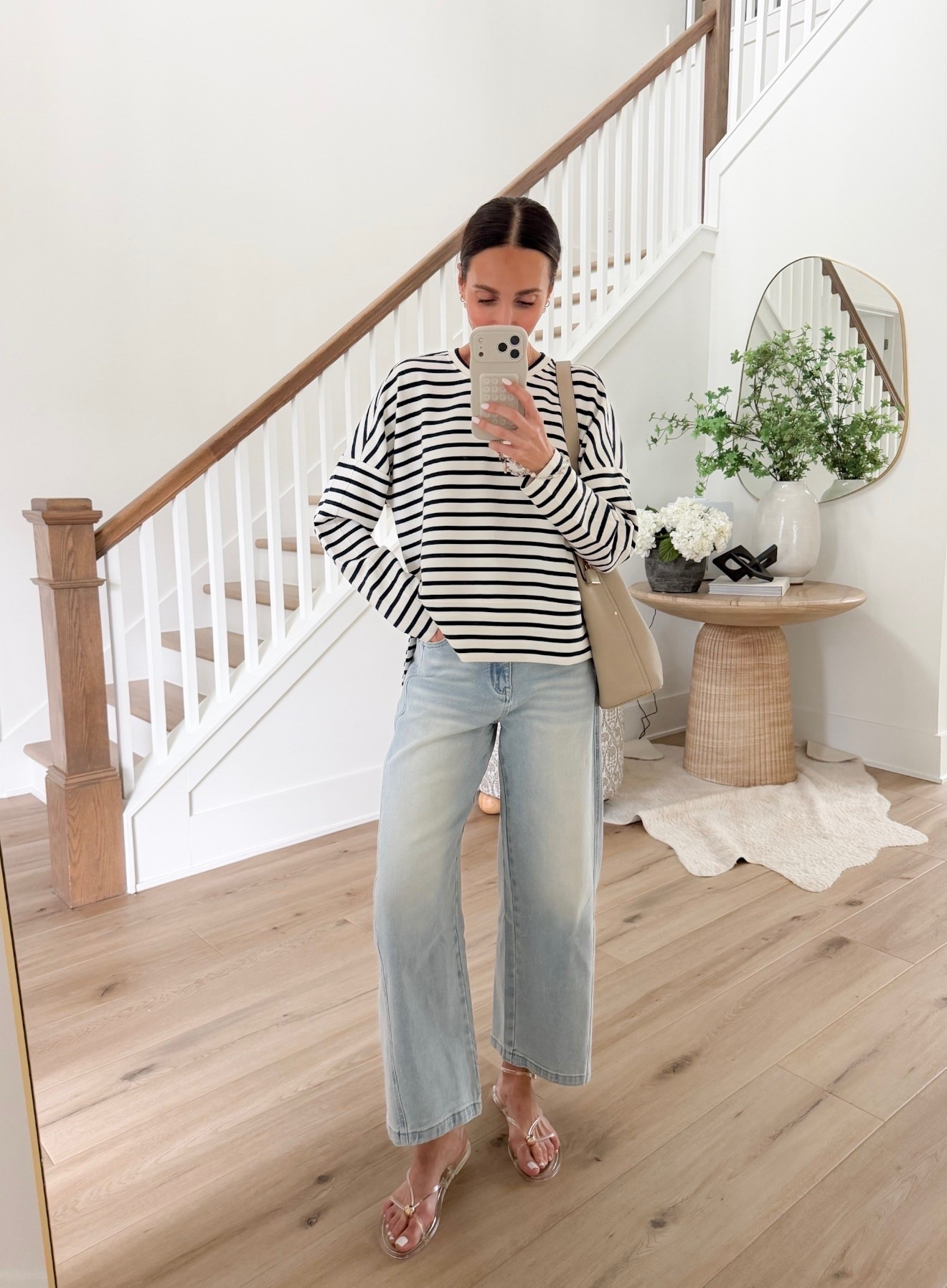 A striped top just never goes out of style 🤍 Paired with light wash denim and clear sandals for an easy outfit that feels classic, effortless, and put together without trying too hard.

striped top, light wash denim, casual outfit ideas, everyday style, capsule wardrobe, elevated basics, neutral style, chic casual outfit, summer outfit ideas, effortless fashion, annabrstyle

#LTKootd #LTKTravel #LTKOver40