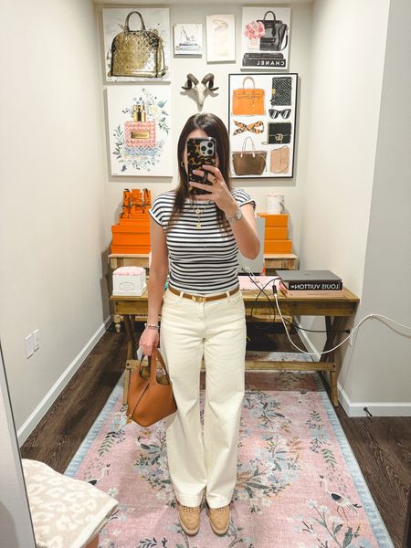 Wide leg ivory ecru jeans that I am OBSESSED with (normal size 25) with a Zara tee and my new fave wedge sneakers 



#LTKstyletip #LTKfindsunder100 #LTKSeasonal