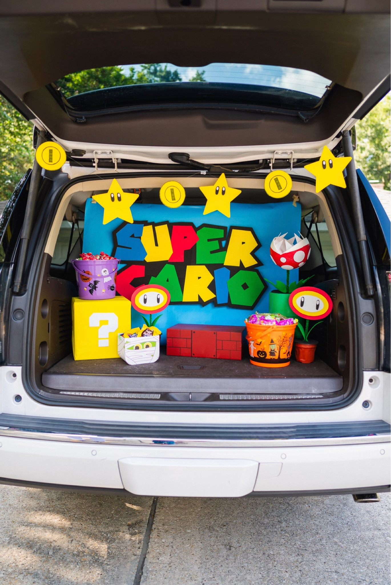 This weekend we won 1st place at our neighborhood Halloween trunk or treat with our Super “Cario”😂 We all dressed In our family Super Mario costumes and brought home the win!

#LTKHalloween #LTKfamily #LTKSeasonal