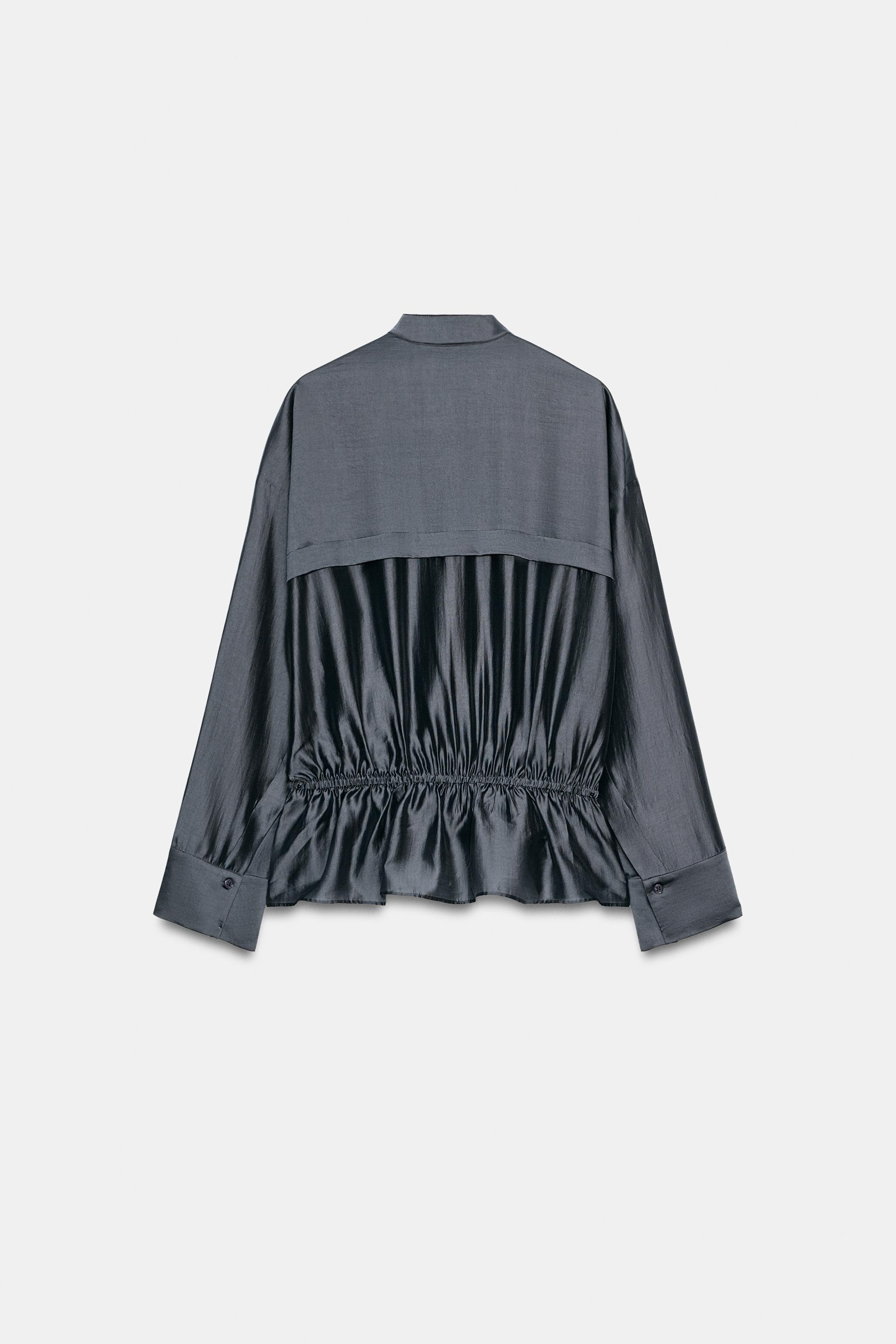 ZARA WOMAN KOLLEKTIONBluse aus einer Lyocell-Mischung. Rundhalsausschnitt und kurze \u00c4rmel mi... | Zara DE