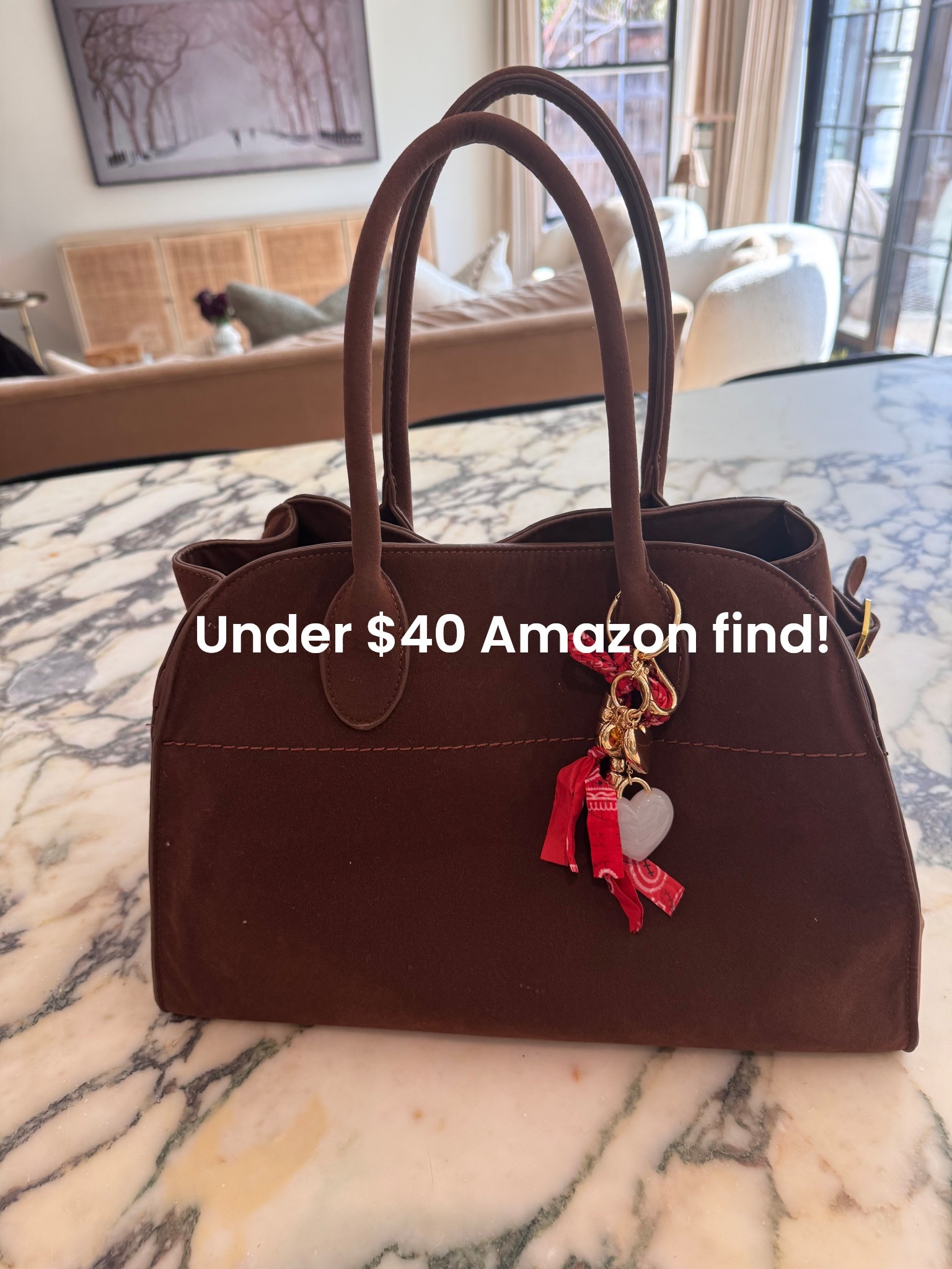 Cutest under $40 Amazon bag. I got the large size & it fits my laptop. It comes in other sizes & colors, too. And I loooovvee my new bag charms! These would be the cutest gift or stocking stuffer! 

#LTKGiftGuide