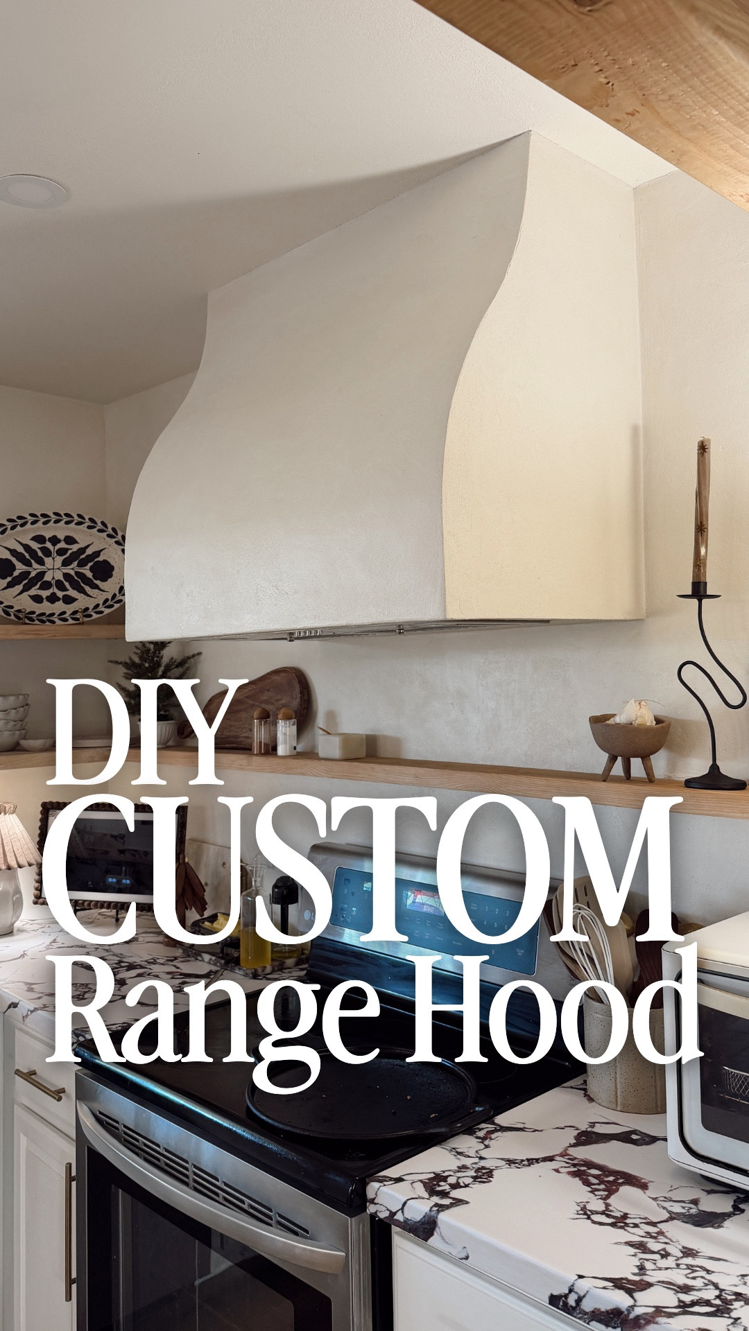 Custom DIY range hood using a made-to-order kit designed to fit my exact kitchen dimensions. This custom range hood was built with no prior construction experience using a pre-cut range hood kit that assembles like an adult puzzle, making a high-end kitchen upgrade feel approachable and doable. I framed the interior to fit my chosen range hood insert, added drywall and drywall mud, then finished the exterior with a micro cement treatment for a seamless, European-inspired look. Using a custom kit from Archways and Ceilings made it possible to achieve a fully custom statement range hood without hiring a contractor, perfect for DIY kitchen renovations, custom kitchen upgrades, and homeowners looking to elevate their space with a bespoke focal point.

#LTKHome