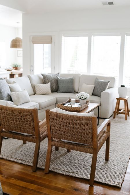 In my living room I have the Pottery Barn chunky wool jute area rug with the Pottery Barn Pearce sectional. I love the wood stool as a side table!  Linking similar woven armchairs  

#LTKstyletip #LTKhome #LTKFind