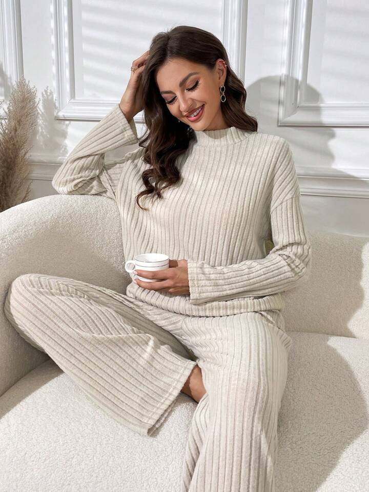 $10.55
      Estimated
        
      -47%
    $20.09Mock Neck Drop Shoulder Lounge Set4.87(30)Co... | SHEIN