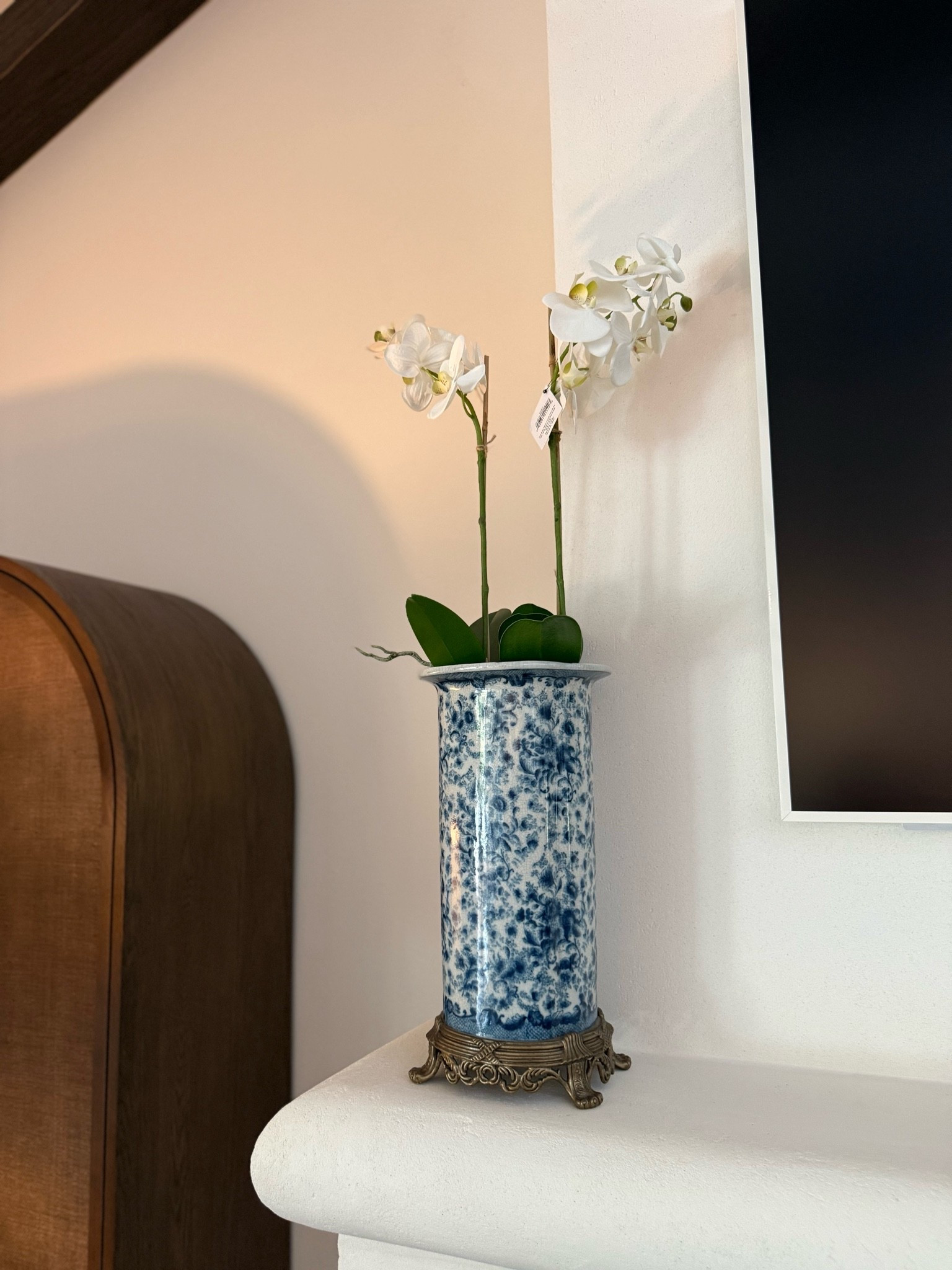 These faux orchid drop ins are realistic and beautiful! Got vase at an estate sale but linked similar.

#LTKOver40 #LTKHome #LTKSeasonal