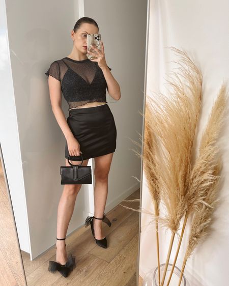 Outfit idea for the festive season 🪩

To make your all black look more interesting, mix together different materials of your pieces - shimmering top & satin skirt is a great combo 

#LTKaustralia #LTKSeasonal #LTKHoliday
