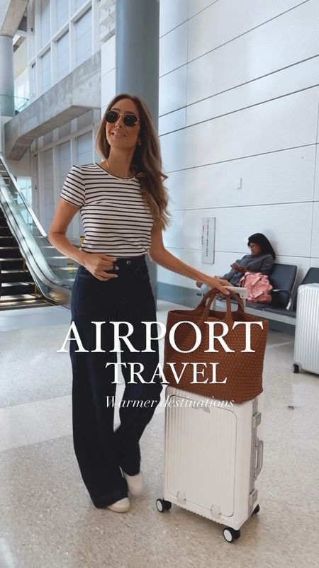 Airport outfits for warmer destinations. Travel outfits for warmer destinations. Wide leg high rise dark wash jeans. Striped tee 
Neutral outfit idea, monochromatic outfit
Lounge travel set, casual chic outfit. 
Travel jumpsuit with zipper on the front. 


#LTKStyleTip #LTKSeasonal #LTKTravel