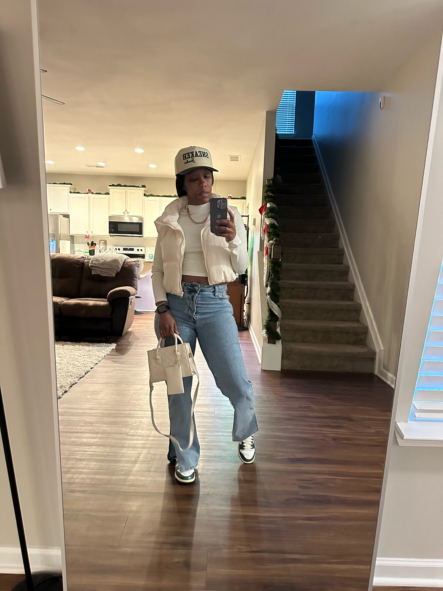 Outfit of the day 🤍

Beige puffer vest, beige crop top, split hem high waisted jeans, beige and green hat, beige purse, and green and white Nike dunk low vintage green sneakers

#LTKFindsUnder100 #LTKStyleTip #LTKSeasonal