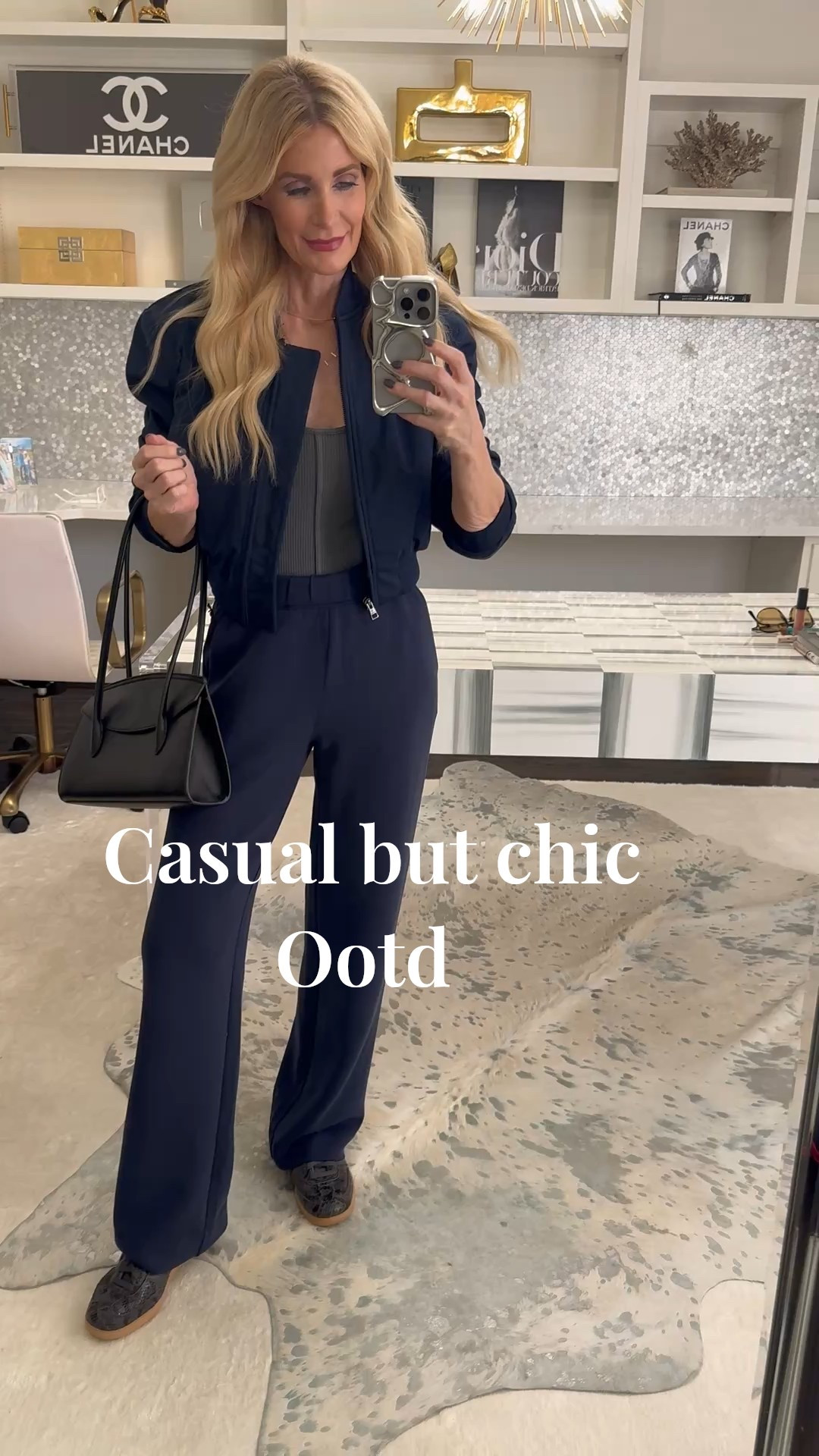 This is one of those athleisure looks that feels as good as it looks. The fabric is incredibly soft, the pants have pockets and an elastic waist, and it’s perfect for travel, running errands, or everyday wear. I love this navy shade and the matching bomber jacket — it also styles beautifully with denim, so you’ll get so much wear out of it. I’m wearing XS in both the jacket and pants, finished with my favorite sneakers for an easy, chic, comfortable look. 

 #LTKActive #LTKSaleAlert #LTKFindsUnder100