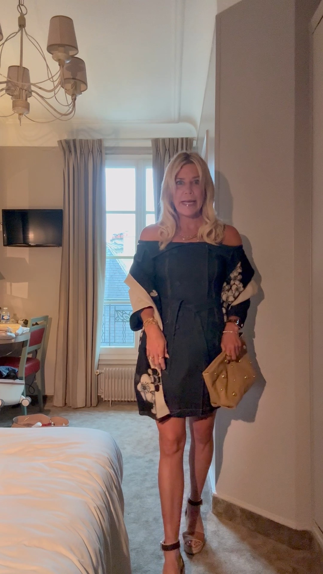 Paris Outfit~ the perfect early fall outfit of a belted denim dress layered with a wool double-sided floral scarf and a cognac clutch with gold grommets and these fall aesthetic wedges. Dress fits true to size. Wearing XS/size 2.

#LTKOver40 #LTKShoeCrush #LTKItBag