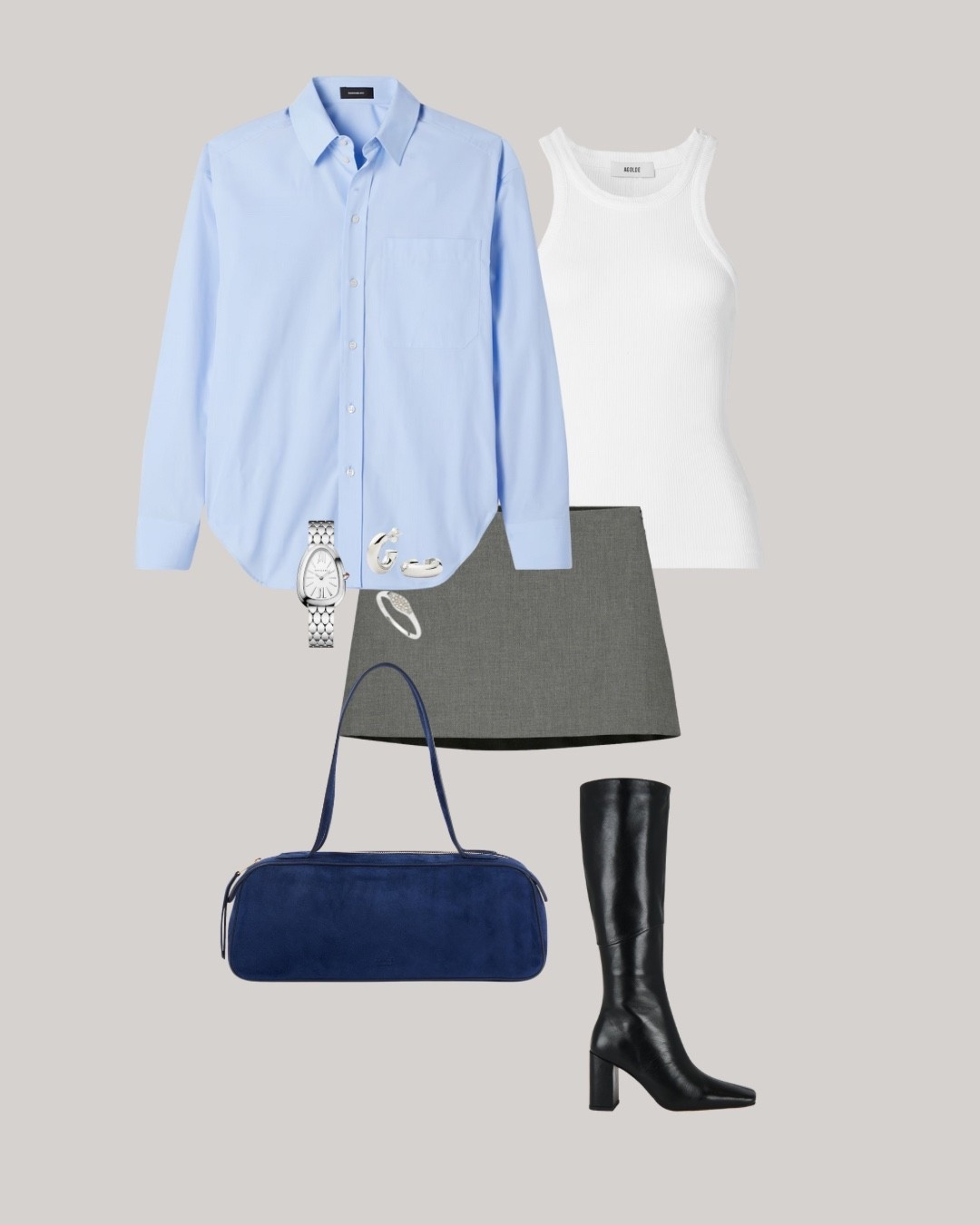 When you’re THAT girl. A look that’s equal parts preppy and undone—an oversized shirt layered over a mini, grounded by tall boots. The timeless palette does the work, with the blue bag adding that unexpected pop. 

#LTKStyleTip