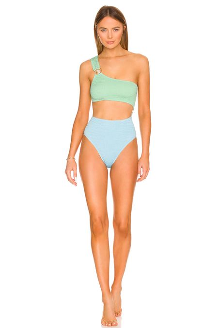 This mint green and light blue swimsuit is so cute!

Mono mini, one piece swimsuit with cutouts, scallop swimsuit, honeymoon swimsuit

#LTKFind #LTKswim