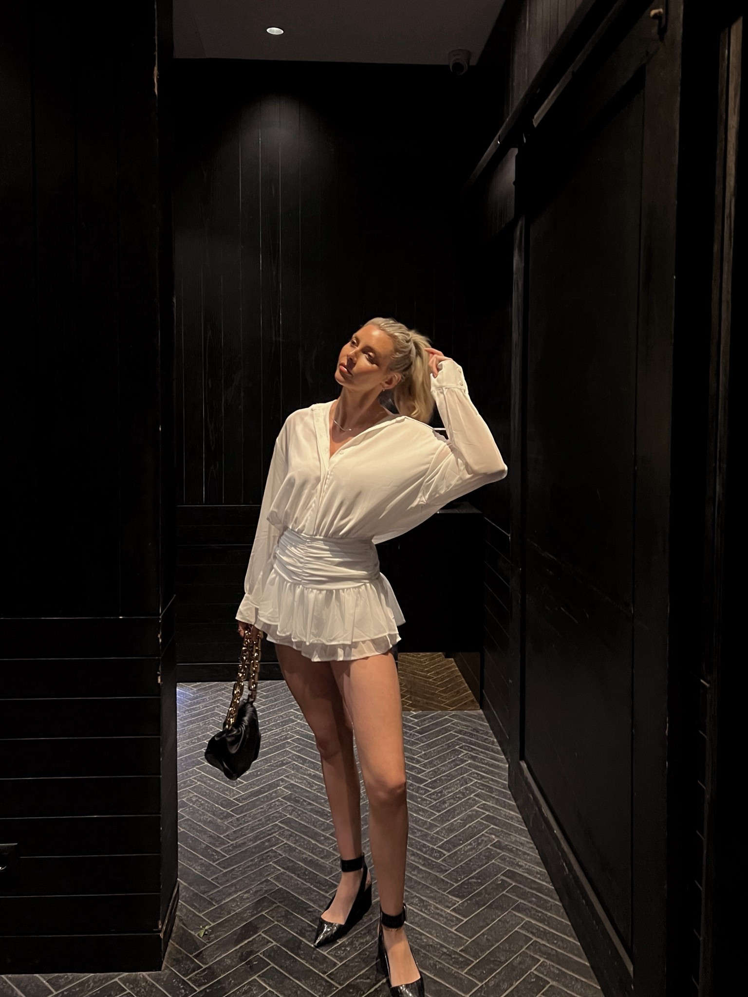 Laretta Ruffled Woven Mini Skort Dress, Amy lynn, mini skort dress, white ruffle dress, bow, date night outfit, London fashion week, day to night outfit, bottega veneta black pouch bag with gold chain, eBay#LTKFashionMonth

#LTKdatenight #LTKuk