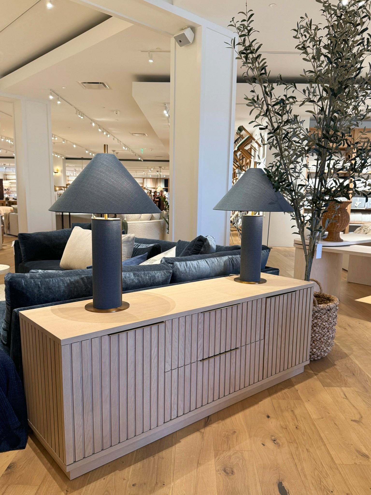 The Batten 72” White Oak Storage Media Console features a beautiful vertical slat design that adds texture and a modern architectural look. 🙌🏻 The warm almond oak finish keeps the piece feeling light and natural while the burnished brass pulls add a subtle touch of polish. ✨Designed with two drawers and cabinets with adjustable shelving, it offers plenty of storage while keeping your living room looking clean and organized. Linked here! 🫶🏻 #LivingRoomInspo #MediaConsole
#ModernDesign 


#LTKSaleAlert #LTKHome