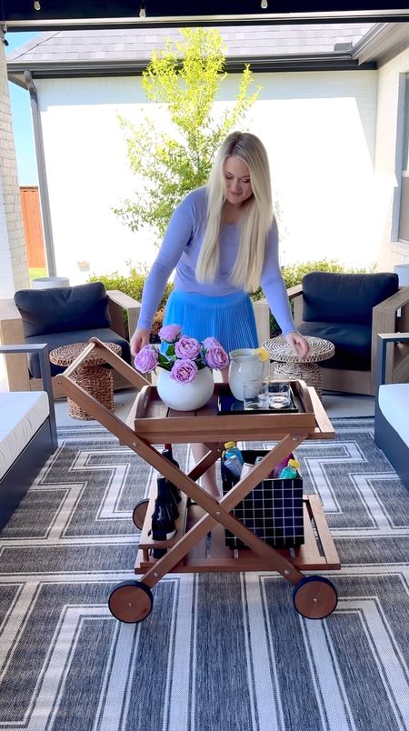 I am in love with this amazing quality outdoor bar cart from @target! I also used my favorite flower frog to help keep the flowers up and separated the saucer and planter to make a beautiful Modern tray and ice bucket! #targetpartner #target @targetstyle #ad

#LTKhome #LTKSeasonal #LTKstyletip