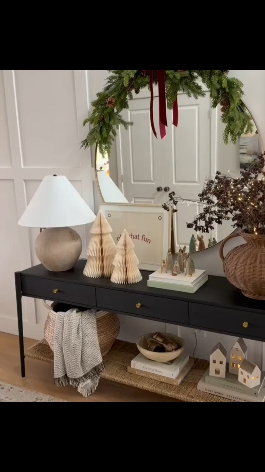 My holiday entryway for 2025! I utilized a mix of holiday decor I have owned and loved for years, a few new pieces such as these berry stems, and neutral styling favorites such as these textured vases for an organic and festive look! The biggest change in my opinion from last year to this year is our floors! 

#LTKHome #LTKHoliday #LTKSaleAlert