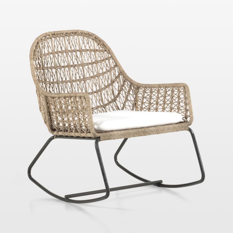 Abie Natural Beige Wicker Outdoor Rocking Chair with White Cushion | Crate & Barrel | Crate & Barrel
