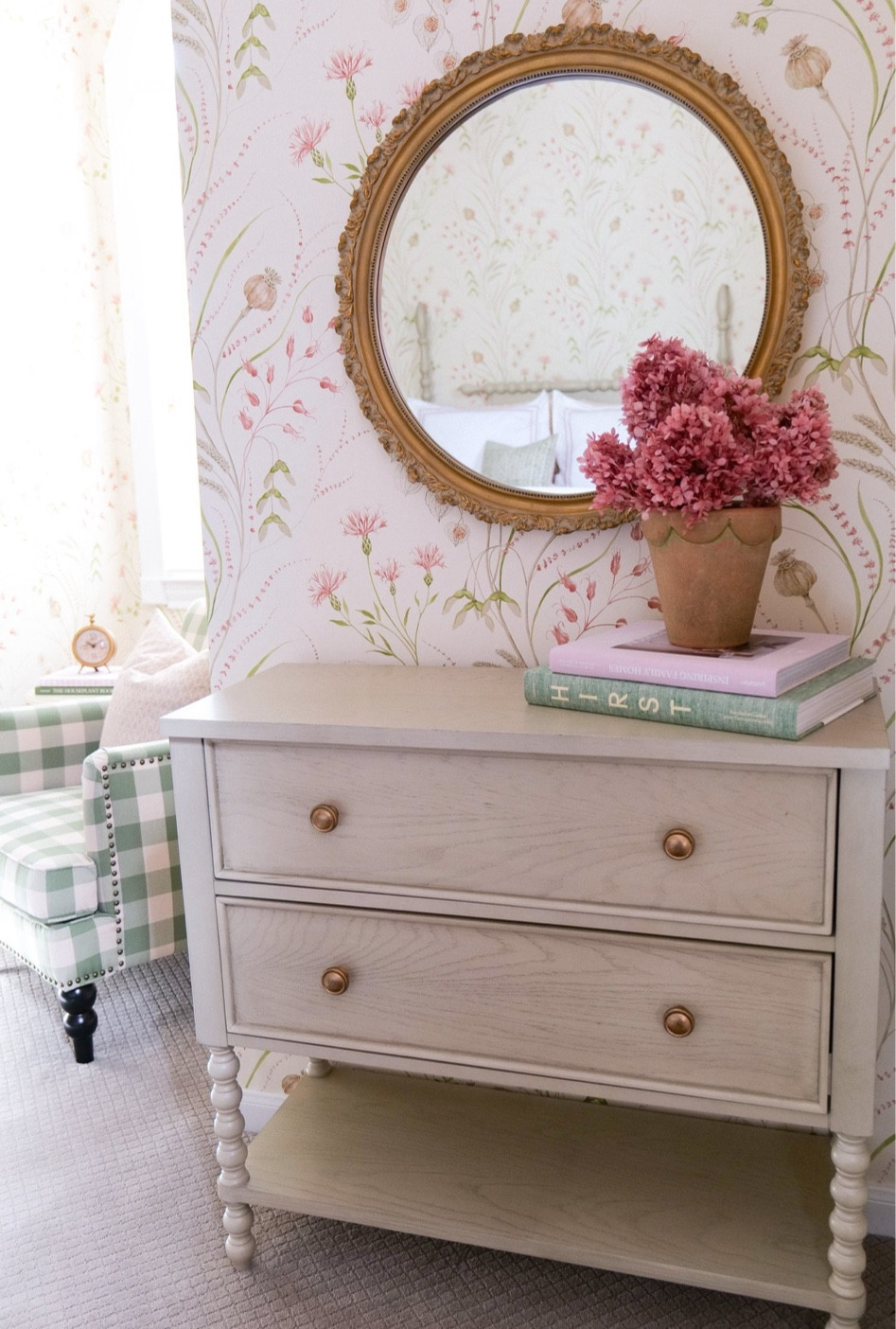 To complete the look, we accessorized the room with small pieces like the custom wallpaper art I created to add character and art. You can see more on how I did this on my Instagram highlight labeled pink & green room.  We also added a few pieces of furniture to create a functional reading space for our guests. The green gingham armchair provides a cozy spot for reading and sipping coffee or just relaxing and looking out the window, all while giving a nice contrasting touch of patterns. We also added a matching dresser to the bed with a mirror over its top with a great find from Round Top, Texas, and this adds a spot for guests to have a mirror as well as store their clothing. Extra blankets were added in this dresser in case the guests get cool at night or while sitting in the armchair. Together, these elements create a warm and inviting space that any guest will find fantastic!

#LTKhome #LTKunder100