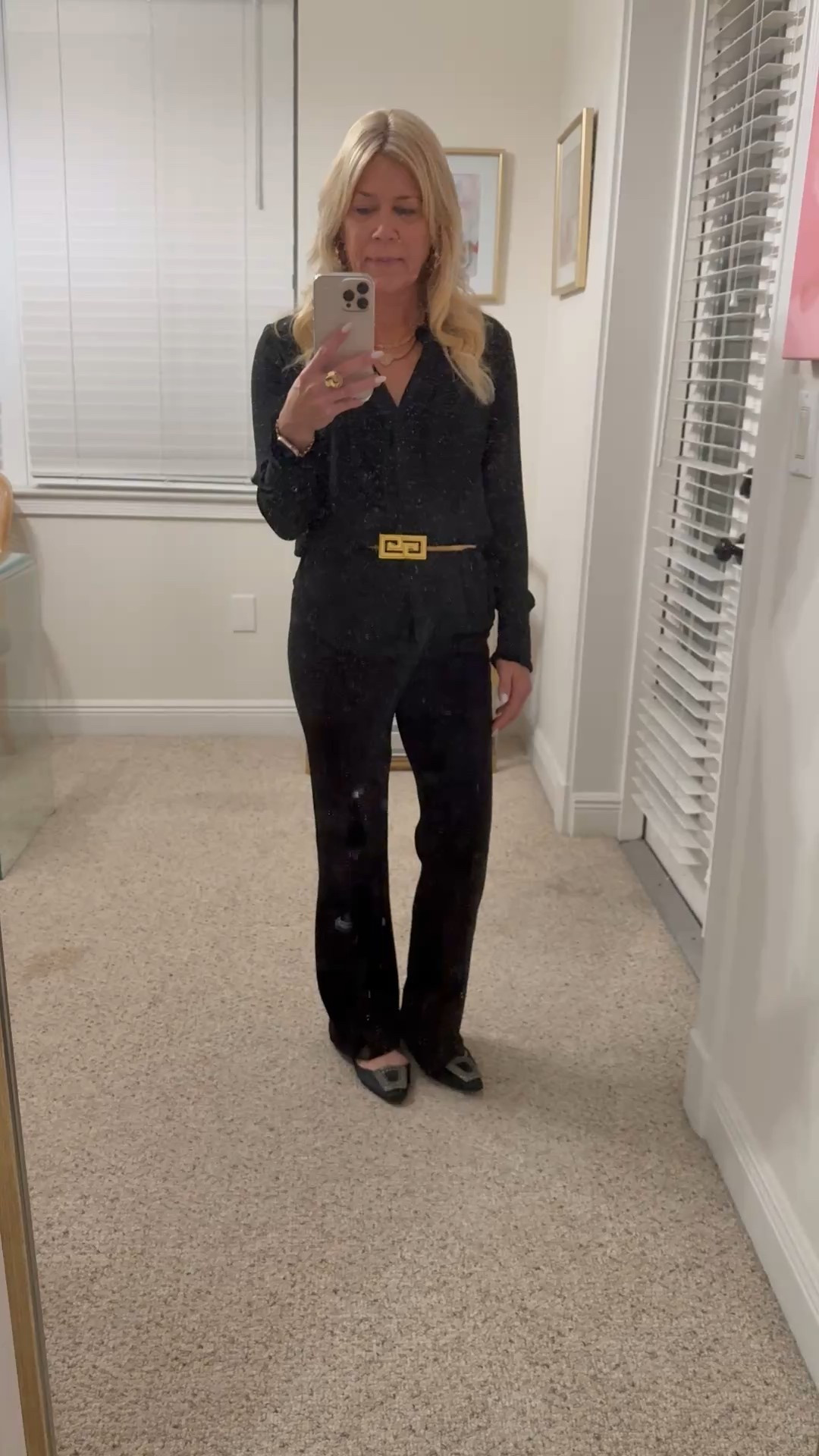 Monochromatic chic outfit you can wear for travel and then out for the day. Love the ease of this outfit with a black tuxedo blouse (old Ann Taylor) and black pointe flare leg pants. Styled with a belt to break up the outfit and give it pizazz. Added necklaces by Sahara Jewelry and unique flats.

#LTKvlog #LTKootd #LTKOver40