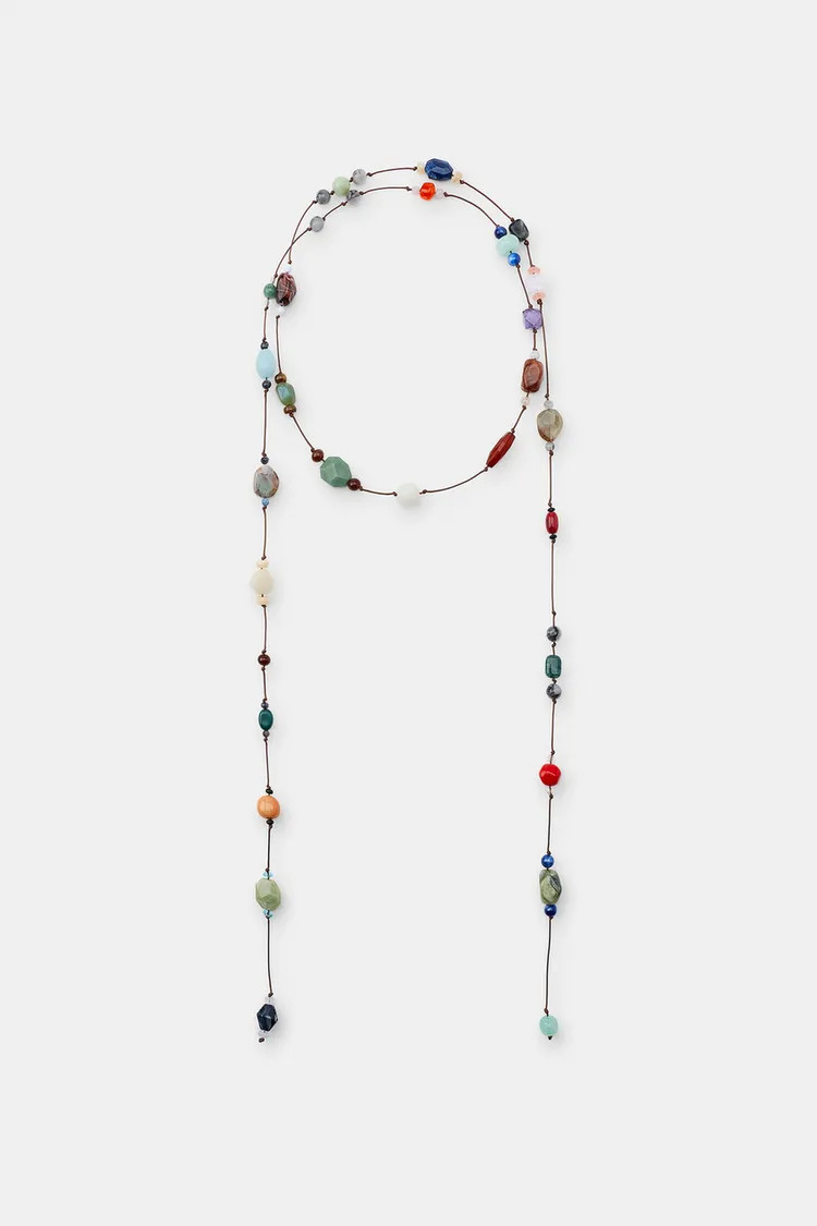 DescriptionContentsMeasurementsCord belt with knots. Featuring natural stone and colorful bead ap... | Zara US