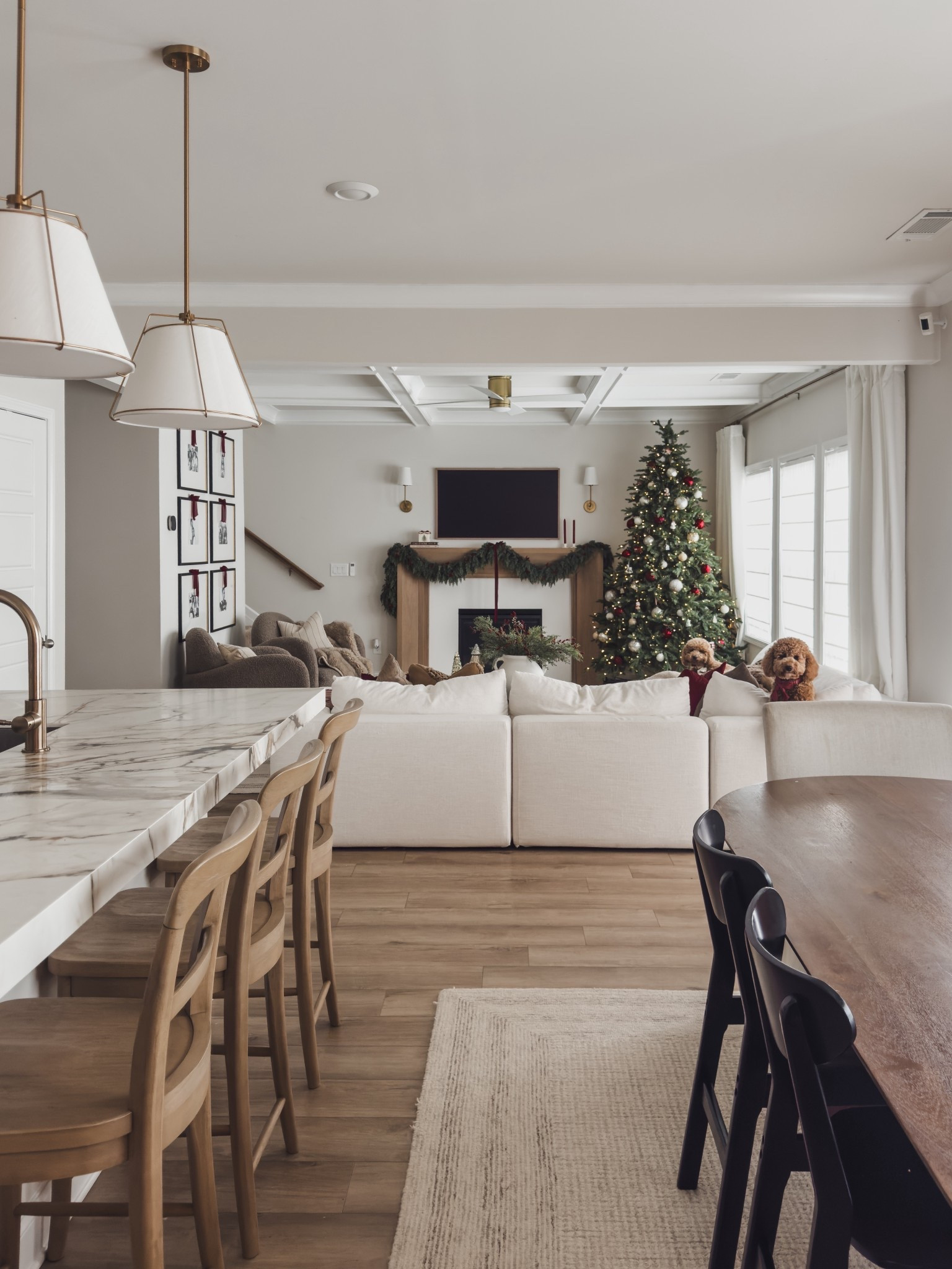 All the traditional Christmas vibes in my open concept living area. Styled with pops of red, vintage decor finds and all of the cozy furniture. 

Wayfair finds, home style, home decor, living room, dining room, fireplace surround, gallery wall, Amazon finds, shop the look! #LTKStyleTip 

#LTKHoliday #LTKHome