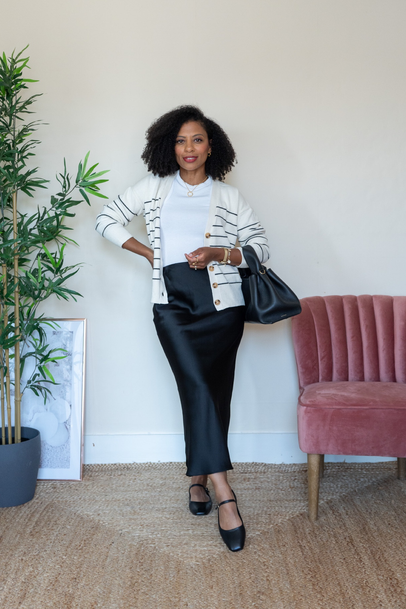 Early Autumn monochrome black and white outfit, consisting of black satin skirt, striped cardigan and black mary jane shoes. 

petite outfit

#LTKstyletip #LTKeurope #LTKSeasonal