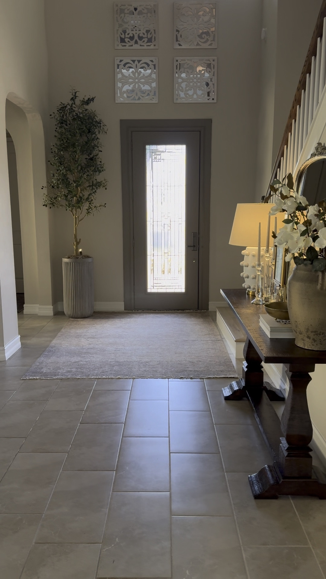 Currently in the process of updating our entryway. I started with a new rug and some paint on the door. I have a few more changes in mind! 
By the way, the new heritage collection from Loloi is amazing. They have the look and feel of vintage rug without the price tag. Highly recommend! 


Loloi, vintage rug, entryway, decor, entryway table, console, table, pottery, barn, planter, terra-cotta, olive tree, nearly natural


#LTKVideo #LTKhome