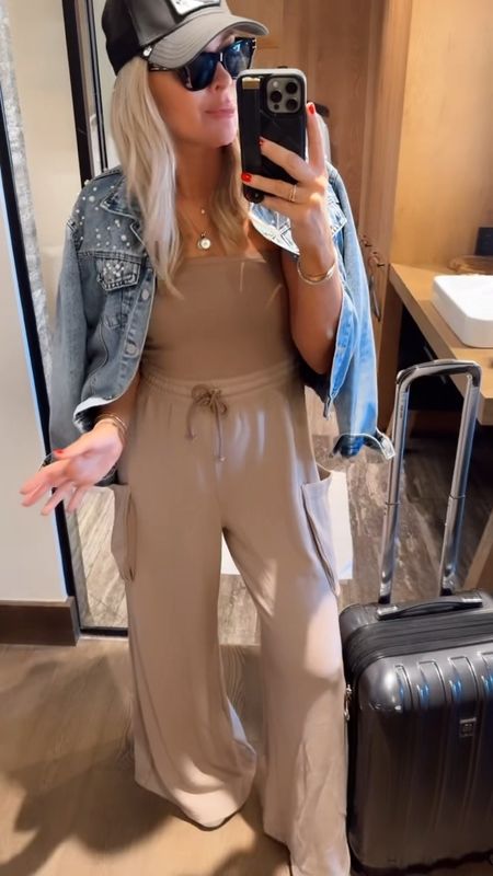 Travel look headed home! They brought back this onesie jumpsuit that I absolutely adore. Cargo pockets, drawstring waist and strapless. Wearing a small! 

Jacket, small.
Shoes, TTS. 

#LTKFindsUnder100 #LTKTravel #LTKStyleTip