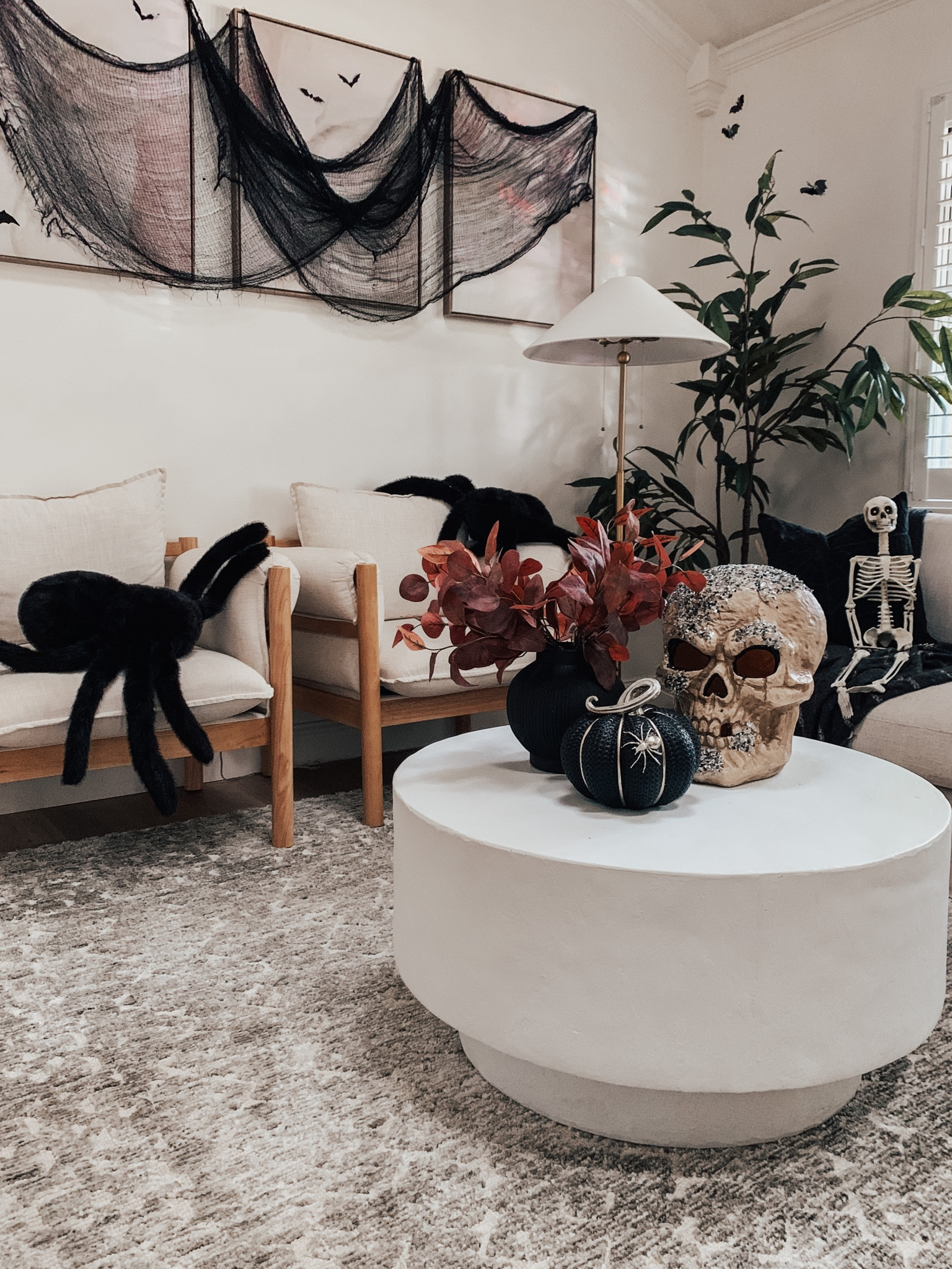 I went over the top with my Halloween Decor this year, turning my home into a Haunted House! These oversized Spider Pillows are a perfect dupe for Sammy The Spider at Pottery Barn! I ordered 2 and chose to drape them over the arm chair in my living room, but these would also look so cool styled as creepy crawlers on a couch or an upholstered bed!

#LTKHoliday #LTKHalloween #LTKSeasonal