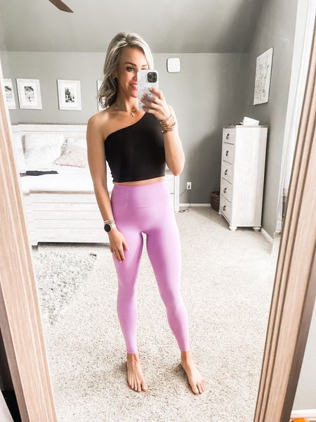 Wearing small in ptula workout leggings and sports bra 