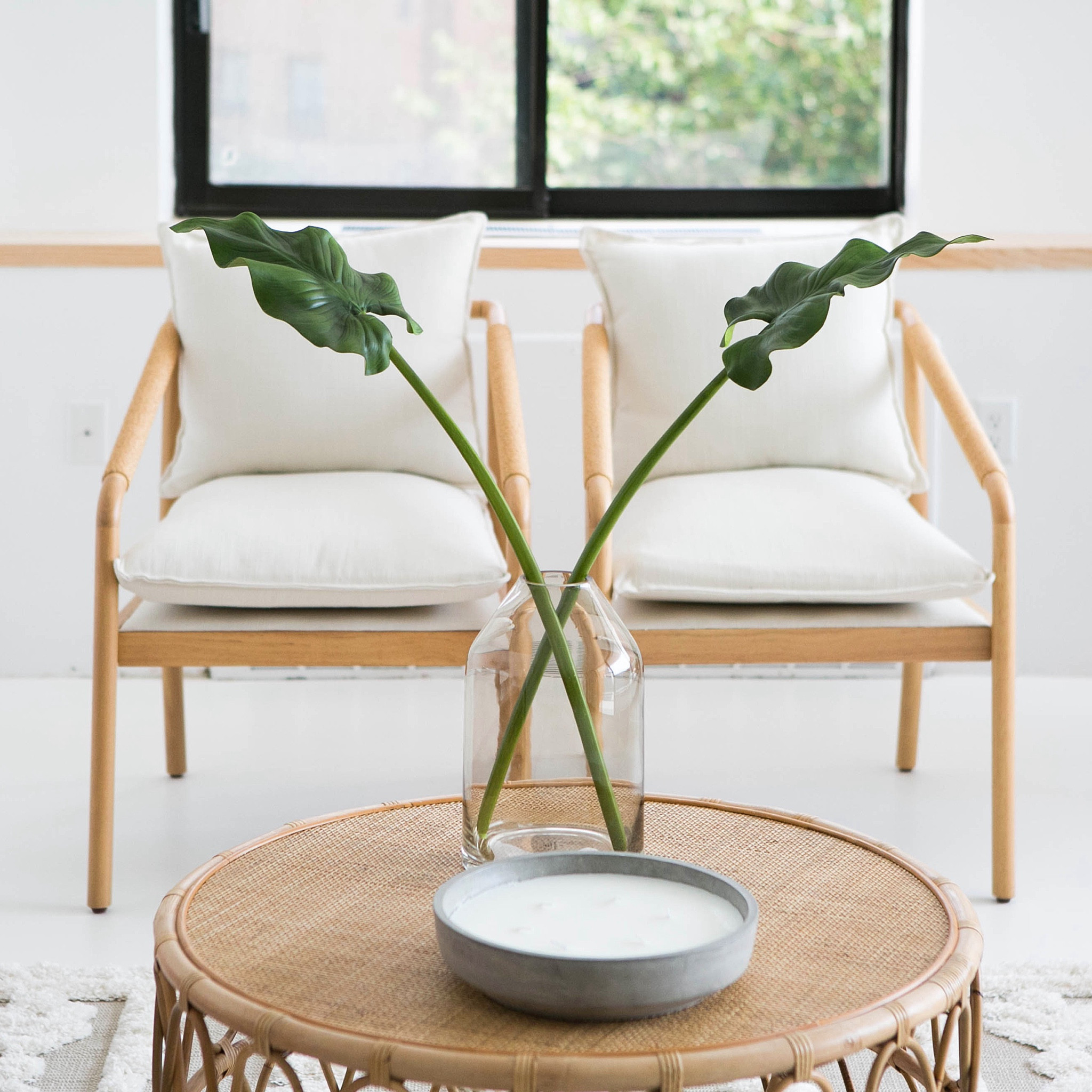 never underestimate the power of a fresh coat of white paint! can you believe that this is the same space? when updating the living room at the #goldengirlscondo, we removed the old bookshelves, allowing the black metal windows to serve as the focal point of the room. next, we painted the walls with our favorite white, @benjaminmoore Chantilly Lace, and swapped out the wood floors for a modern epoxy finish. these simple cosmetic changes completely transformed the space. #dwelloctober

#LTKhome