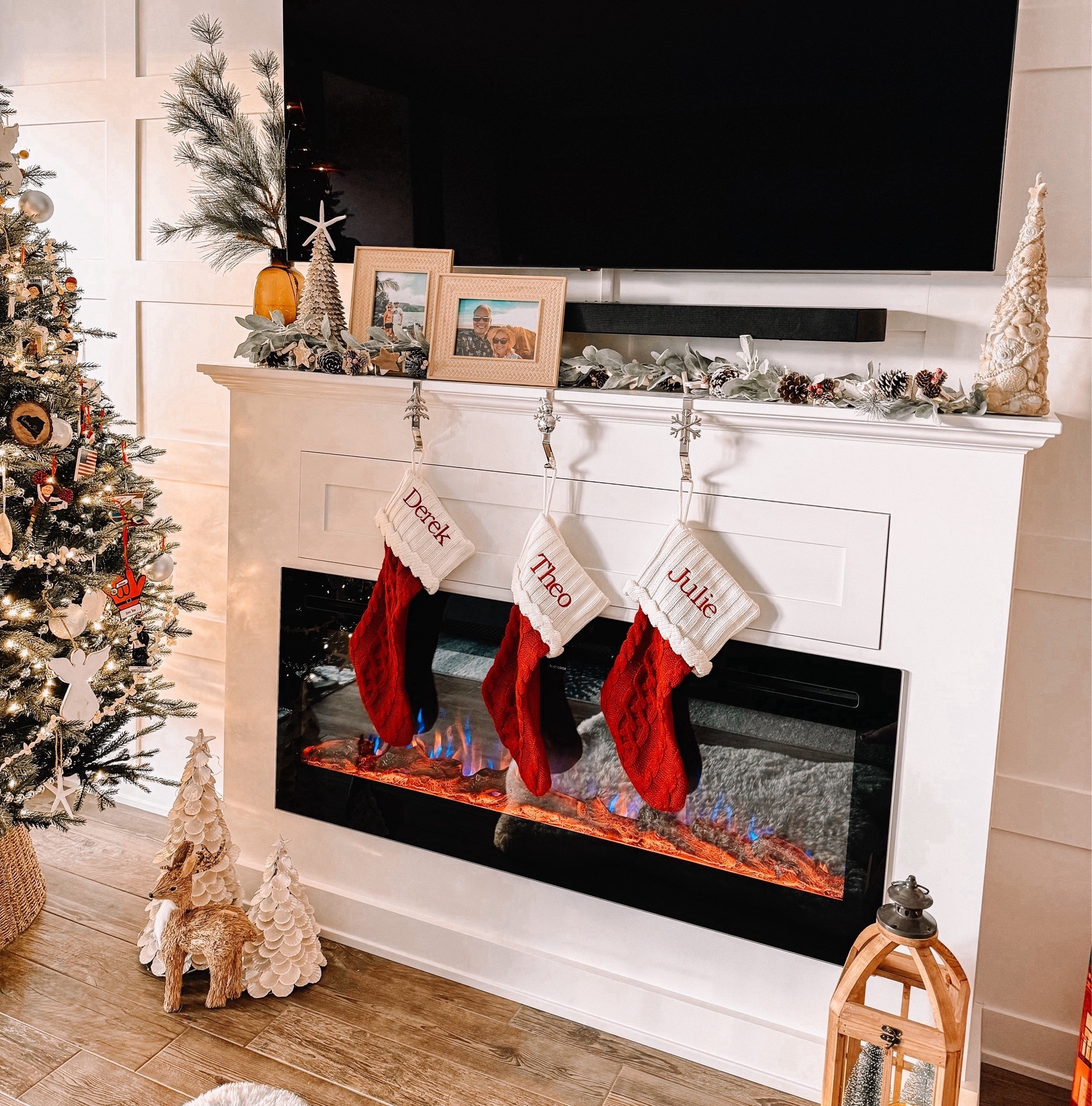 I did away with my big and bulky Christmas garland for our mantle and went with a lighted lamb’s ear. I intertwined a pinecone garland with it. 

I like to keep some of my everyday decor and mix in Christmas. 

I also swapped my palm leaves in my amber vase for pine stems. I also found some cute coastal Christmas trees with shells and starfish. ❤️

#LTKHoliday #LTKSeasonal #LTKhome