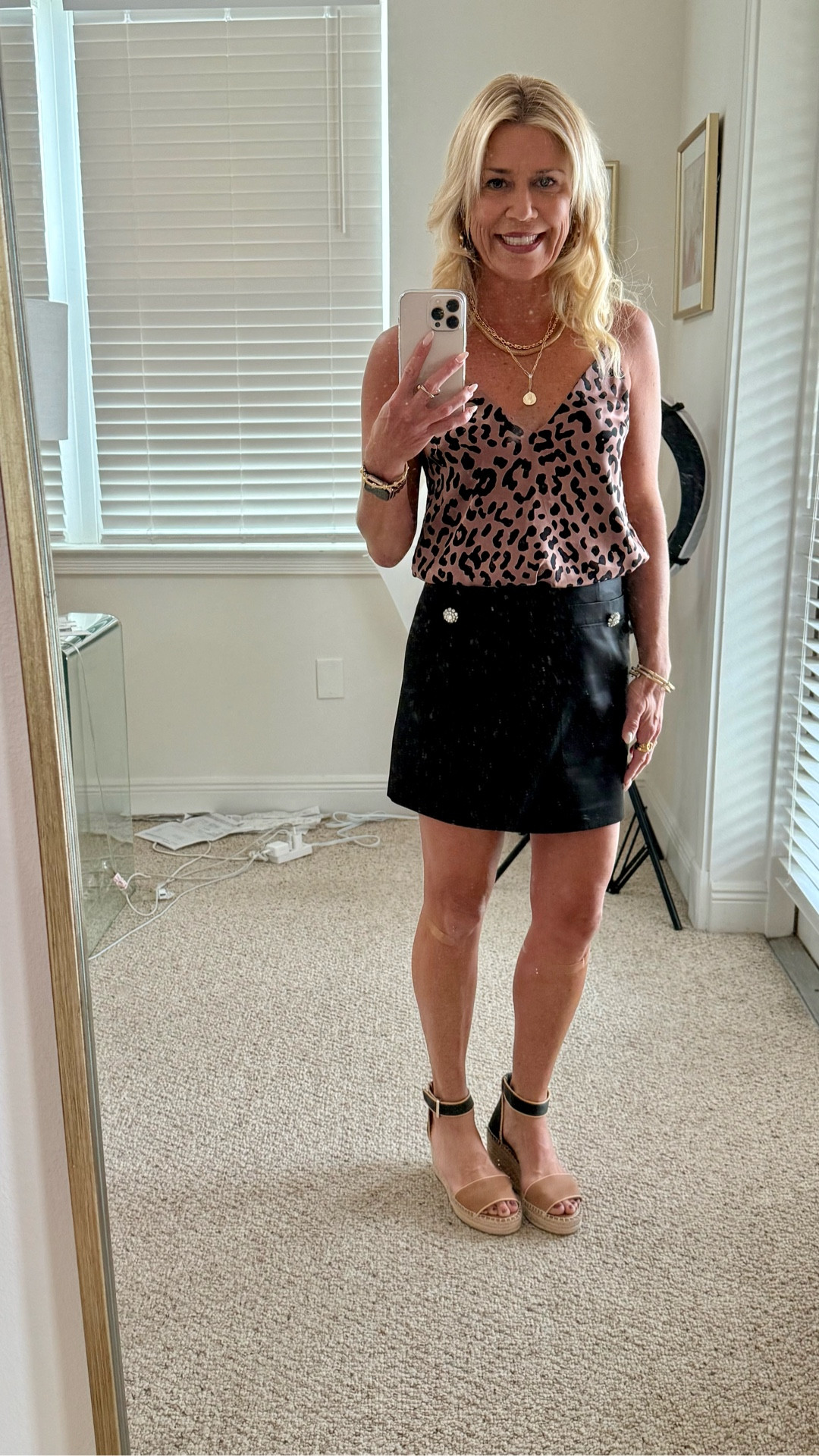 Fall fashion outfit for warm weather locales. Animal riot cami top aired with a black crystal embellished buttons skirt and fall aesthetic wedges. Added some favorite jewelry pieces to make the look unique. Skirt fits true to size as does top. 

#LTKOver40 #LTKSeasonal #LTKPetite