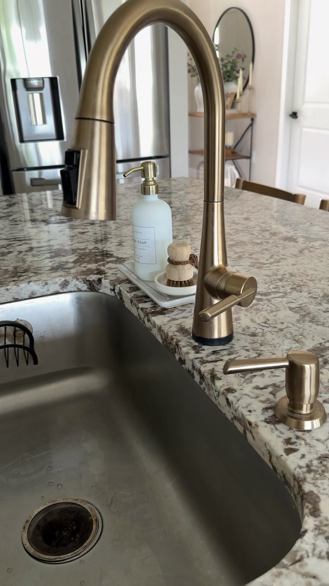 I upgraded our kitchen faucet last year, and it’s one of those things I use and appreciate every single day.

My youngest son used to struggle reaching the handle on our old faucet, but now he can just tap anywhere on the faucet to turn it on and off. It even has an auto shut-off feature, so we’re not wasting water if someone forgets to turn it off.

Bonus: the batteries lasted an entire year.

And the Champagne Gold finish is just gorgeous. ✨

#lowesfinds #whiteandgoldkitchen #neutralhomedecor

#LTKHome