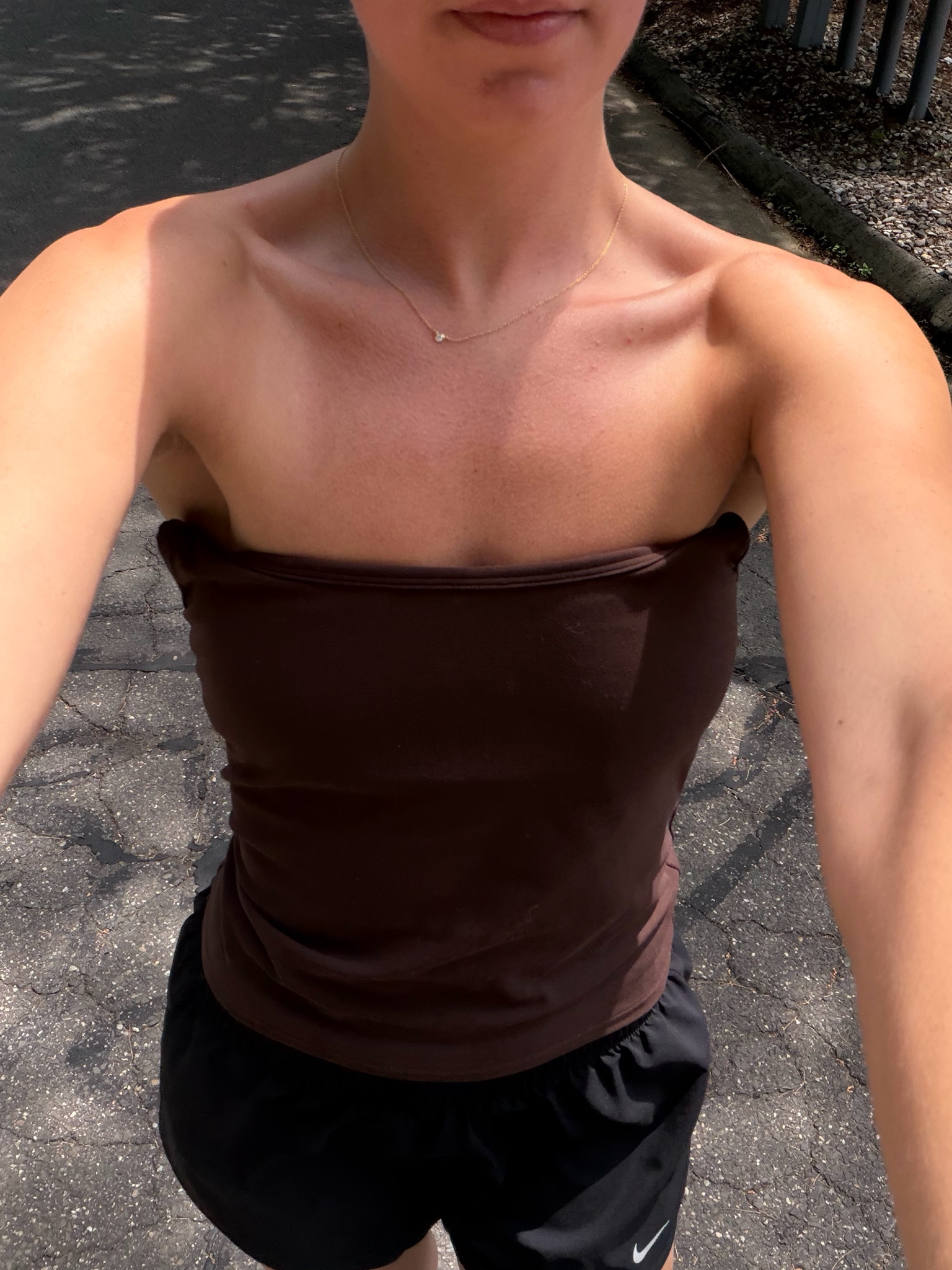 Another walking outfit. I pull the straps down on my tanks ti avoid tan lines! The Nike shorts are my favorite - I swear a size small and have them in 3 colors. 

 #LTKootd #LTKfitnessgoals #LTKActive