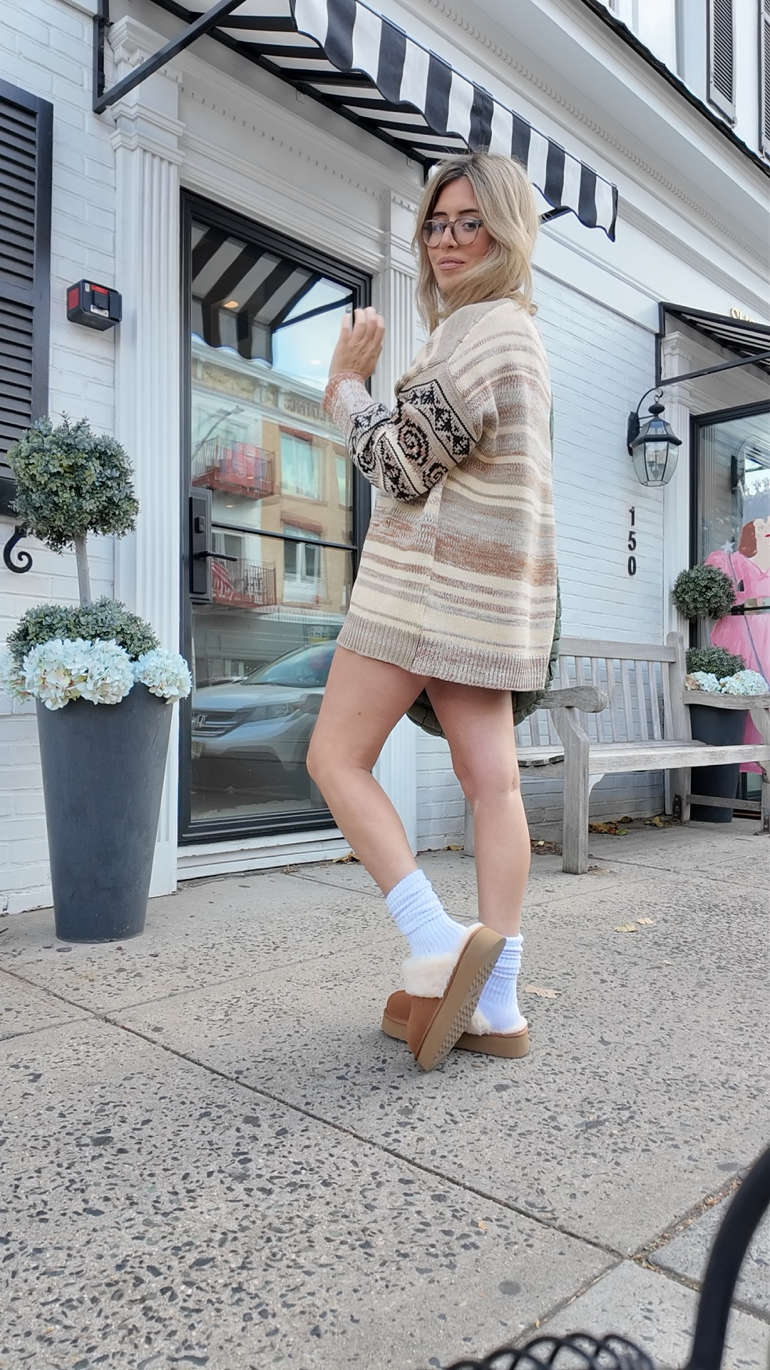 This sweater!!! I love Urban Outfitters so much, the prices aren’t so high and the quality of clothes is great, especially if you want the “free people” style of clothes in your wardrobe! The Ugg dupes were given to me by the company Stelle Brand and are so cute and comfy, socks are from Amazon, and shorts are an older pair that I’ve had from Amazon as well! 

#LTKHoliday #LTKGiftGuide