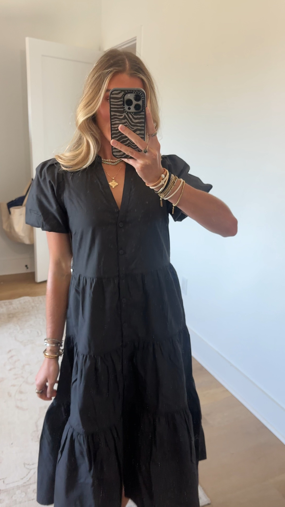 @Brochu Walker size xs 
The Havana, the dress we are known for, is the iconic Brochu Walker essential. This sophisticated, signature dress silhouette is assured to take you from season to season. A tiered skirt and puff sleeves give a definitive feminine appeal, while the collared v-neck and button front placket make it as chic as it is versatile. Designed to be worn belted or loose and flowing, it is the one piece that can take you everywhere.

#LTKootd #LTKWorkwear #LTKdayinmylife