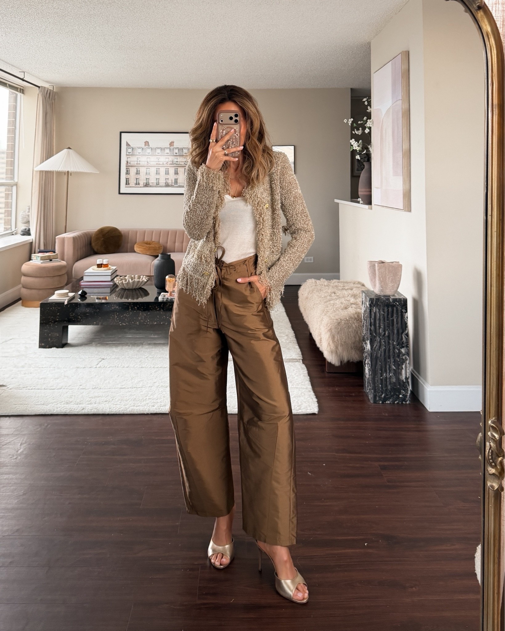 Our beloved taffeta pants are back in stock in the bronze color so I had to wear it again, this time with this gorgeous fringe knit from fall 26 presentation at NYFW! Love the bold details, removable shoulder pads and gold buttons.

#LTKootd #LTKSeasonal #LTKOver40