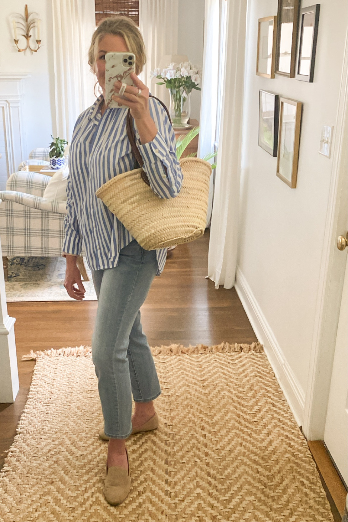 Ready for spring!  This blue and white striped shirt is a favorite.  Runs large.  

#LTKunder100 #LTKitbag #LTKstyletip