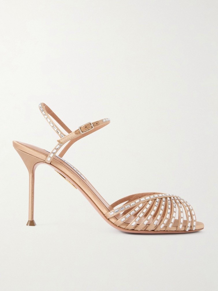 AQUAZZURA
Hold Me 85 crystal-embellished satin sandals

Perfect for glamorous events, Aquazzura's 'Hold Me' sandals glisten unstoppably thanks to their crystal-drenched straps. They're made from satin and set on an 85mm heel that's subtly flared at the tip for balance.

Fits true to size, take your normal size
Italian sizing


Material: satin
Lining: leather
Sole: leather insole and sole
Closure: buckle-fastening ankle strap
Hardware colour: silver
Made in Italy
Colour: beige

#LTKTall #LTKValentine #LTKPetite