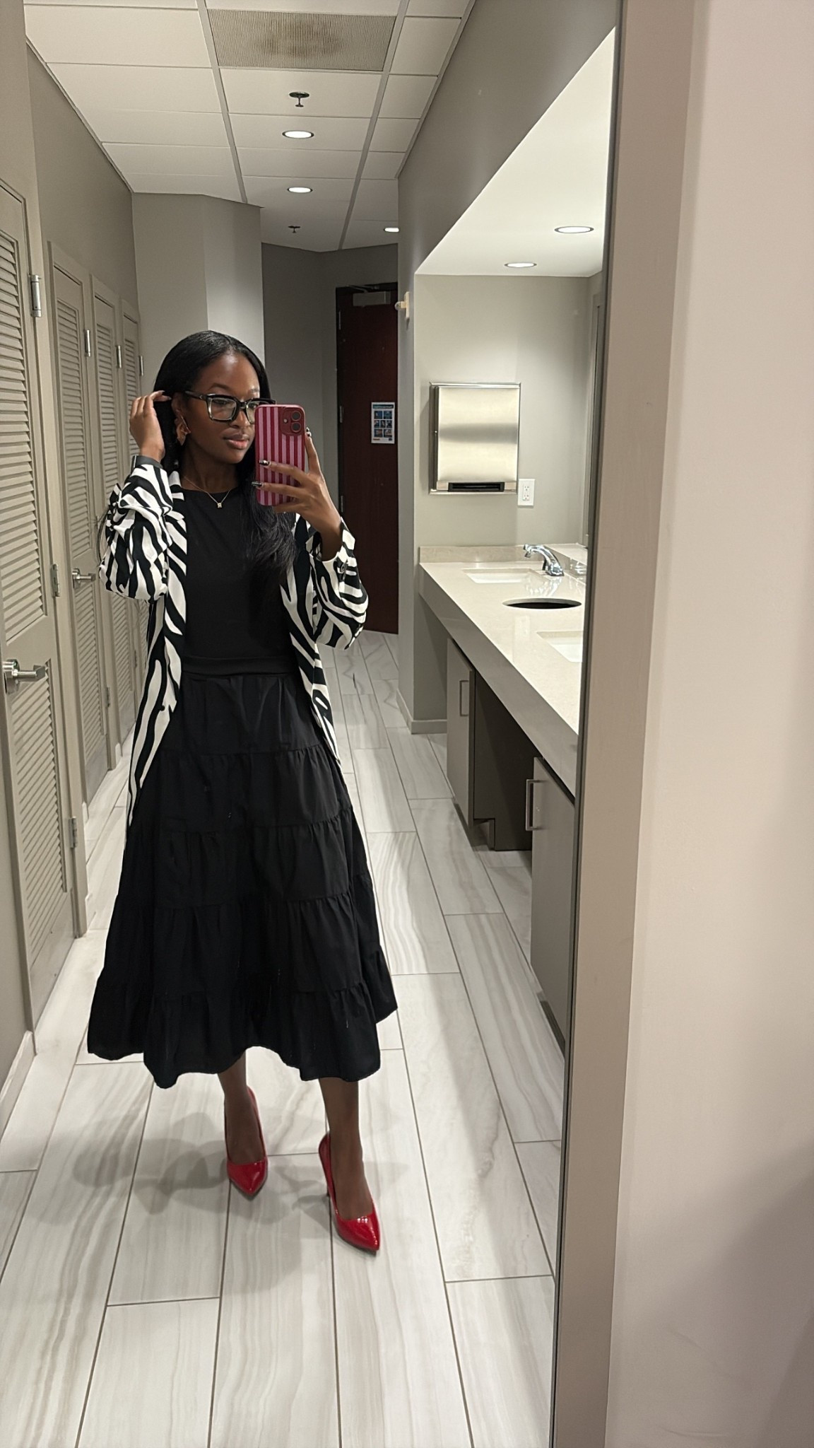 The zebra print blazer dress is from H&M but I do wear it as a blazer. The black dress is from TJMaxx and so are the red shoes  

#LTKWorkwear