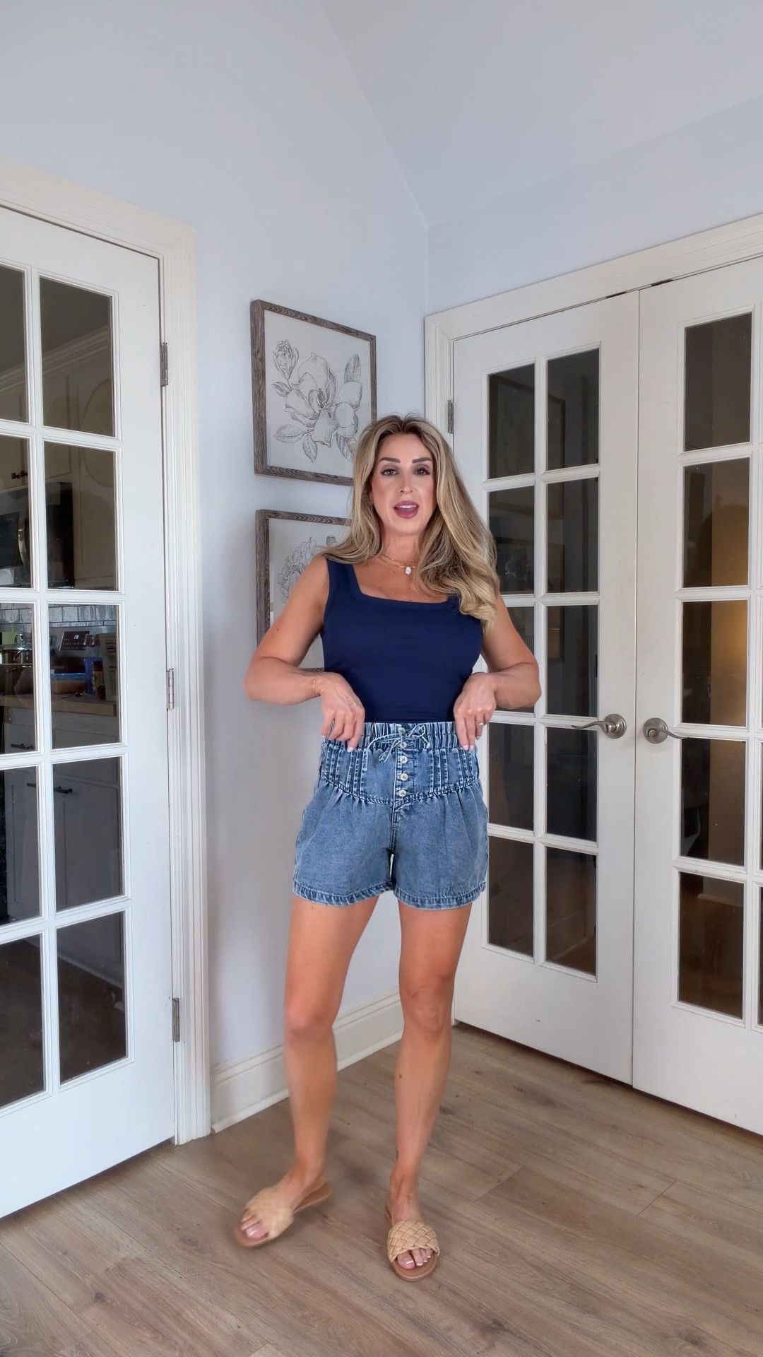Cutest little denim shorts from Amazon. Elastic waist and pintuck details. 

Spring outfits 2026, summer outfits 2026, pull on shorts, navy tank top with built in bra, neutral beach sandals, vacation outfits 

#LTKmomlife #LTKootd #LTKgrwm